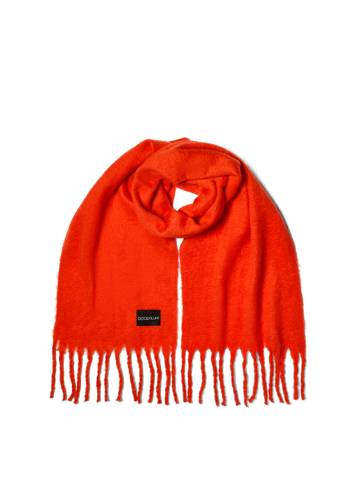 Orange scarf with fringes on a white background