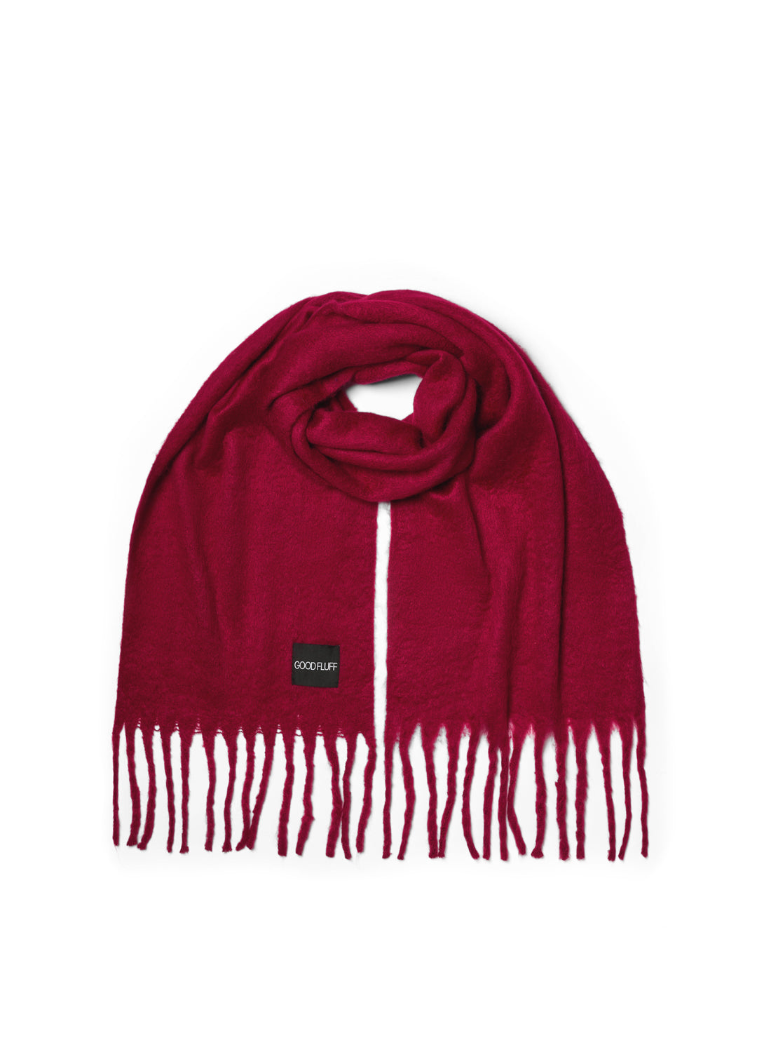 Cherry red scarf with fringes and a brand label on a white background