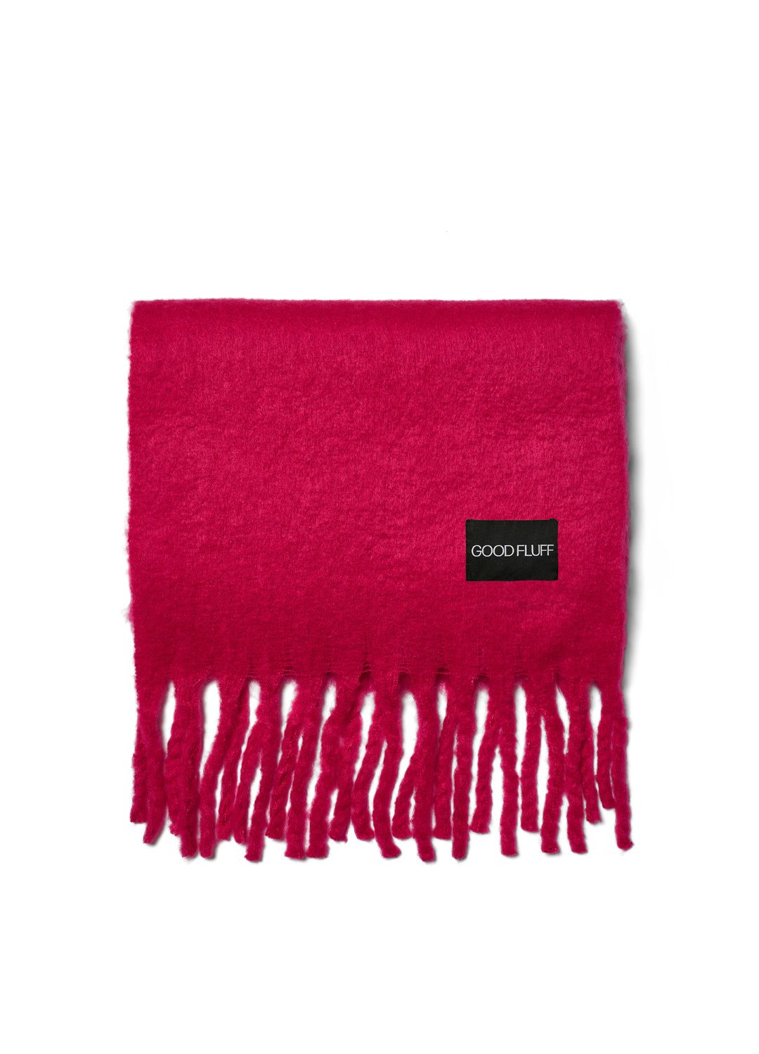 Fuchsia Pink scarf with fringes and 'GOOD FLUFF' label on a white background