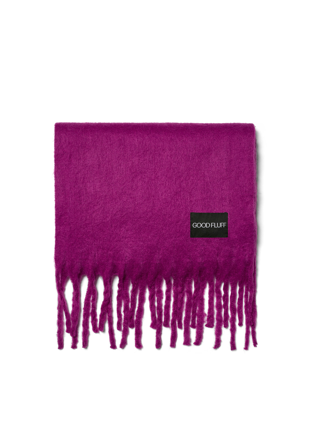 Purple scarf with fringe and 'Good Fluff' label on a white background