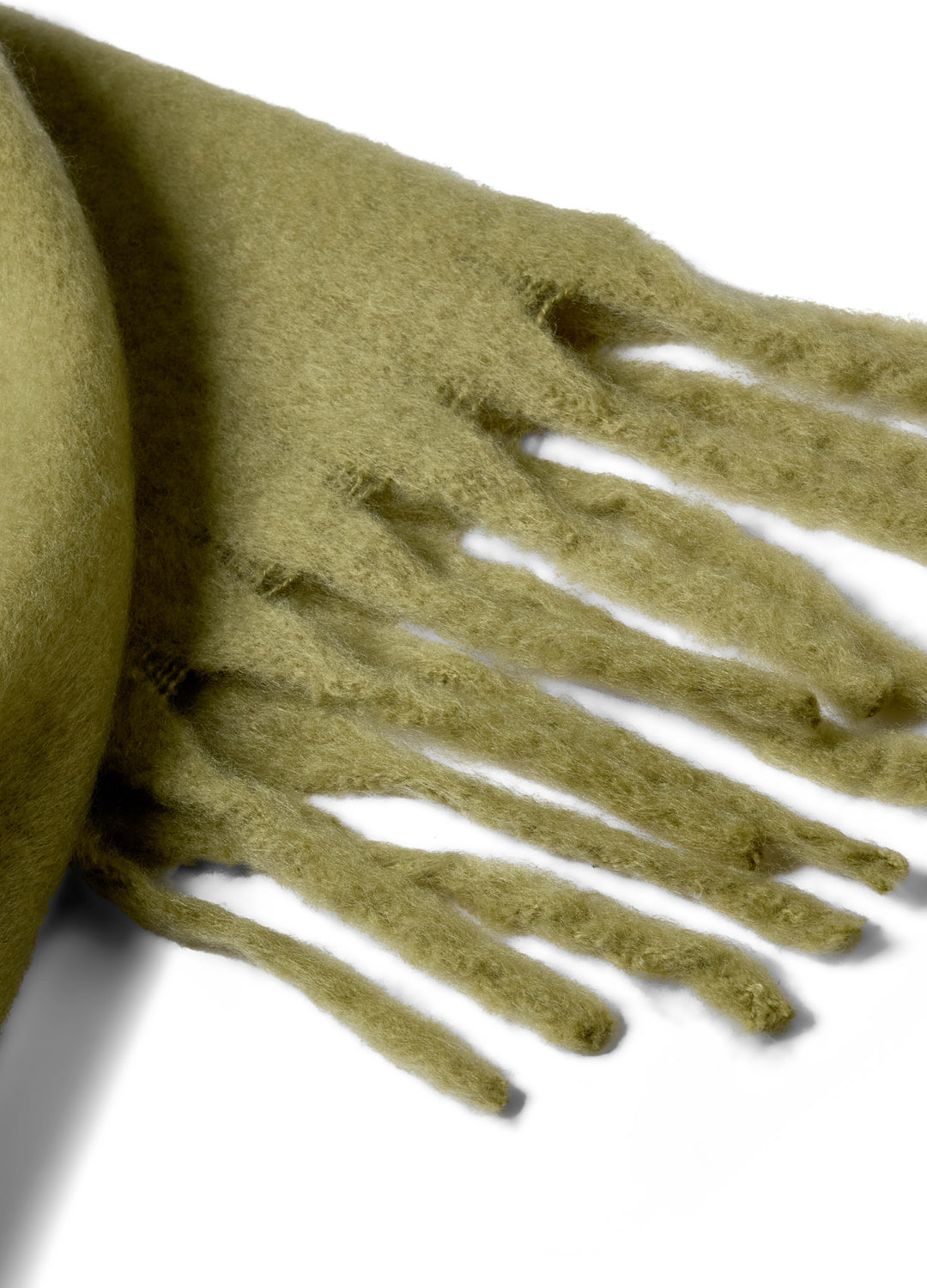 Green scarf with fringes on a white background