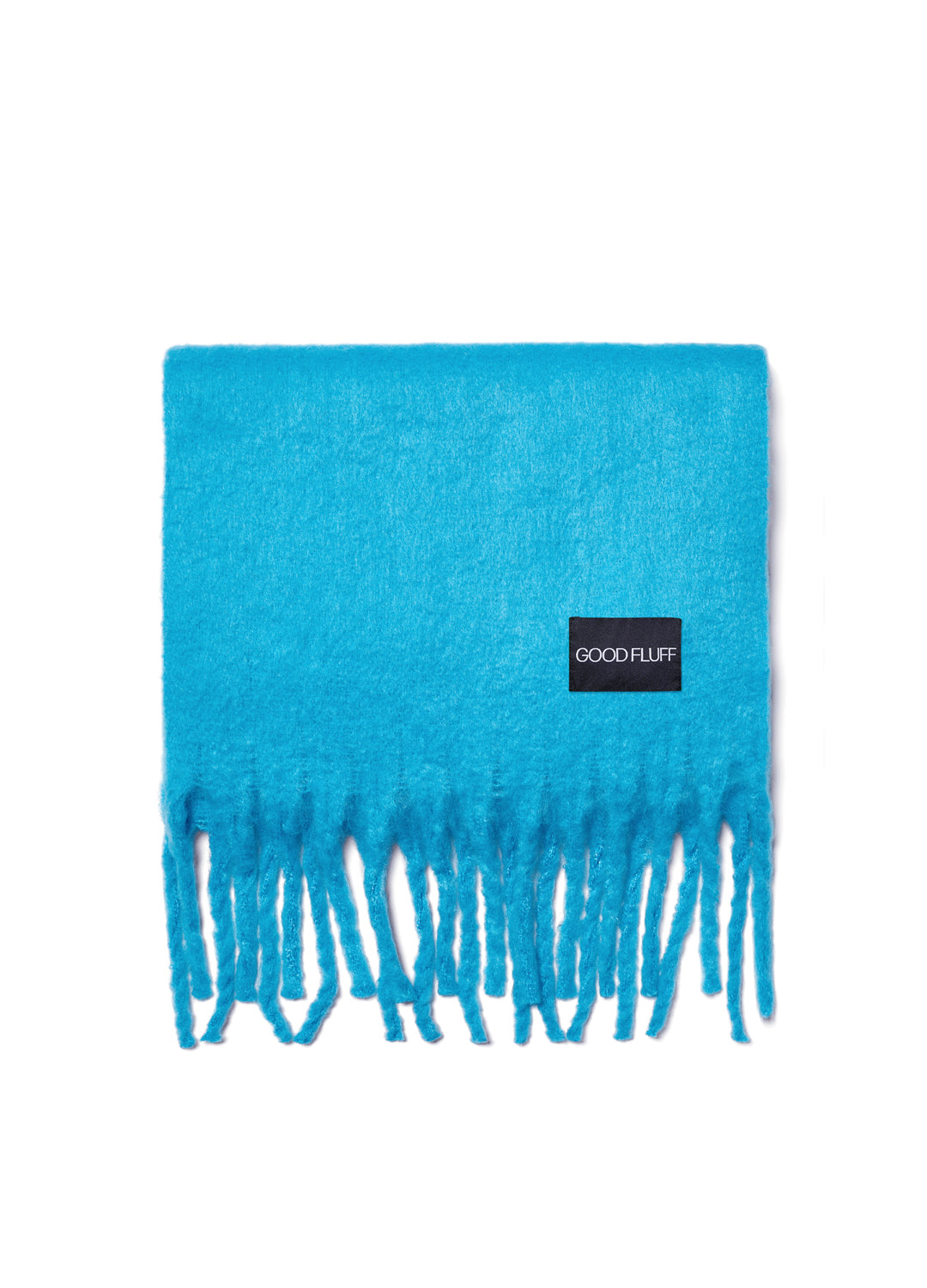Blue scarf with fringes and 'Good Fluff' label on a white background