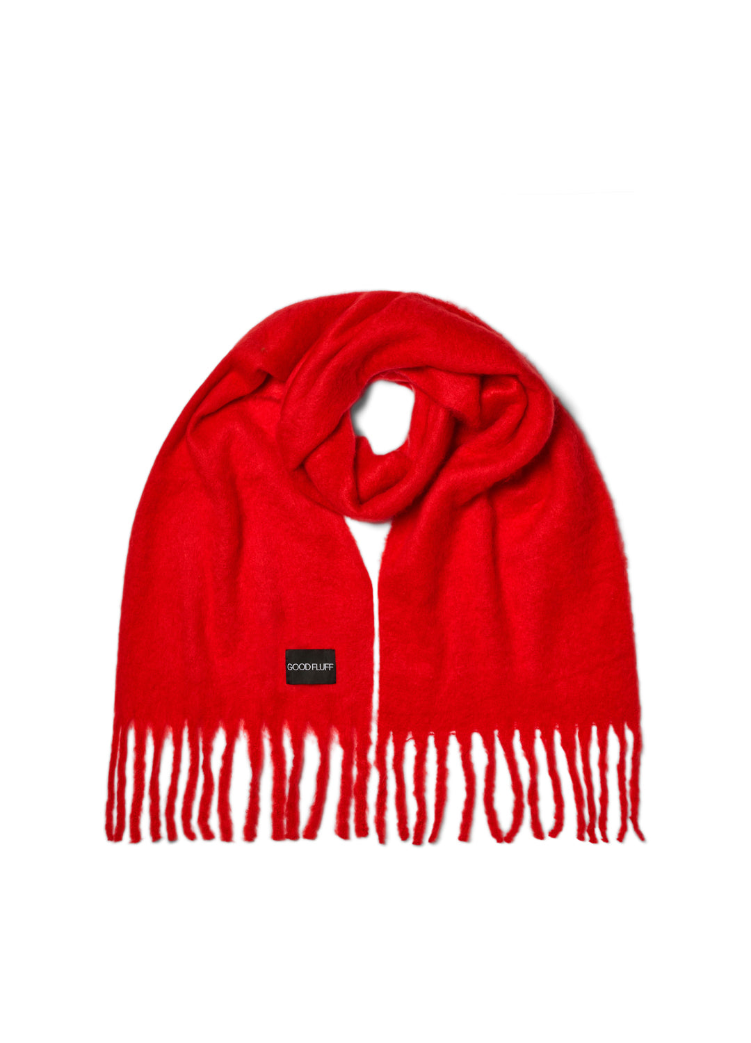 Bright red scarf with a brand label on a white background