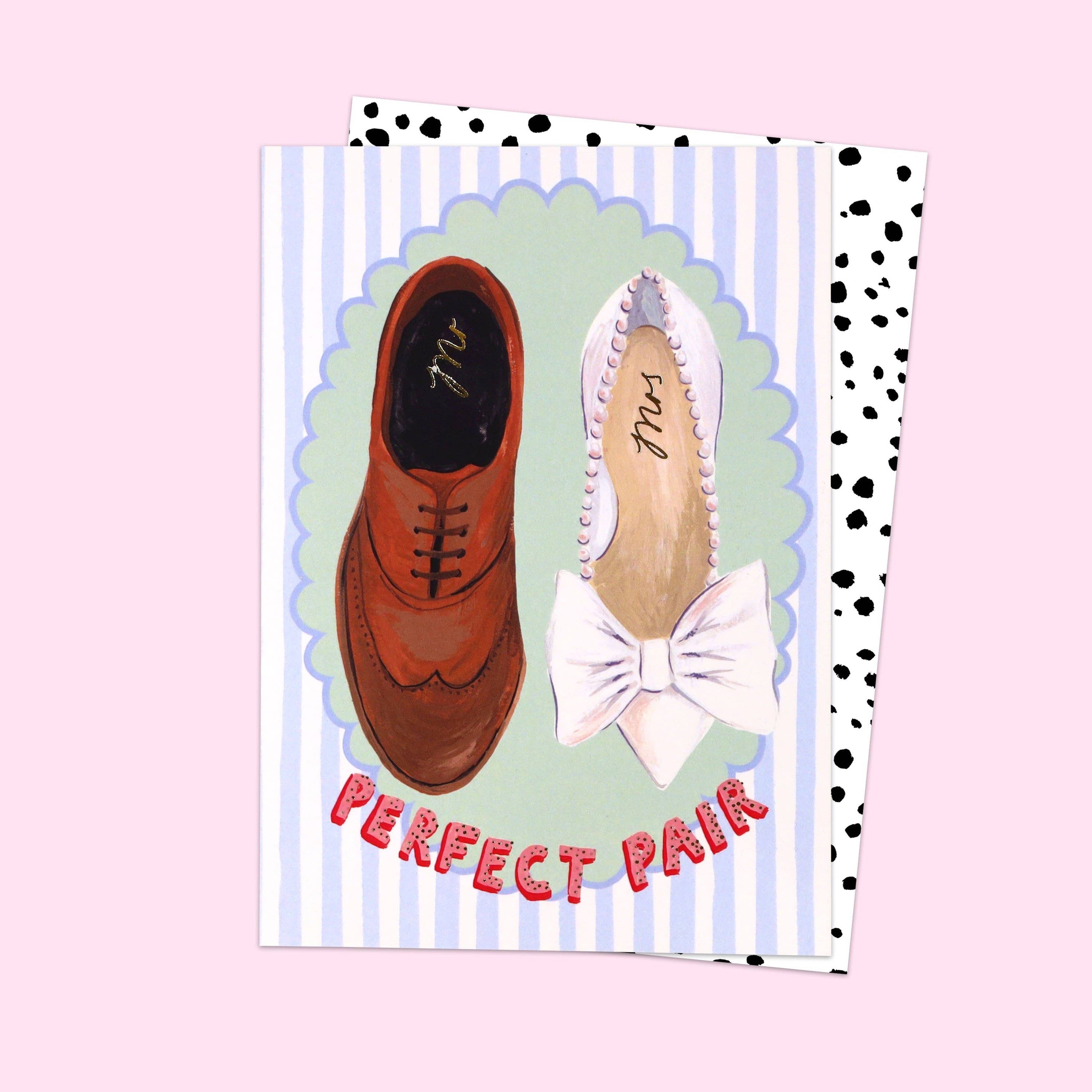 Card with illustration of a brown shoe and white shoe with a bow, labeled 'Perfect Pair', on a striped background.