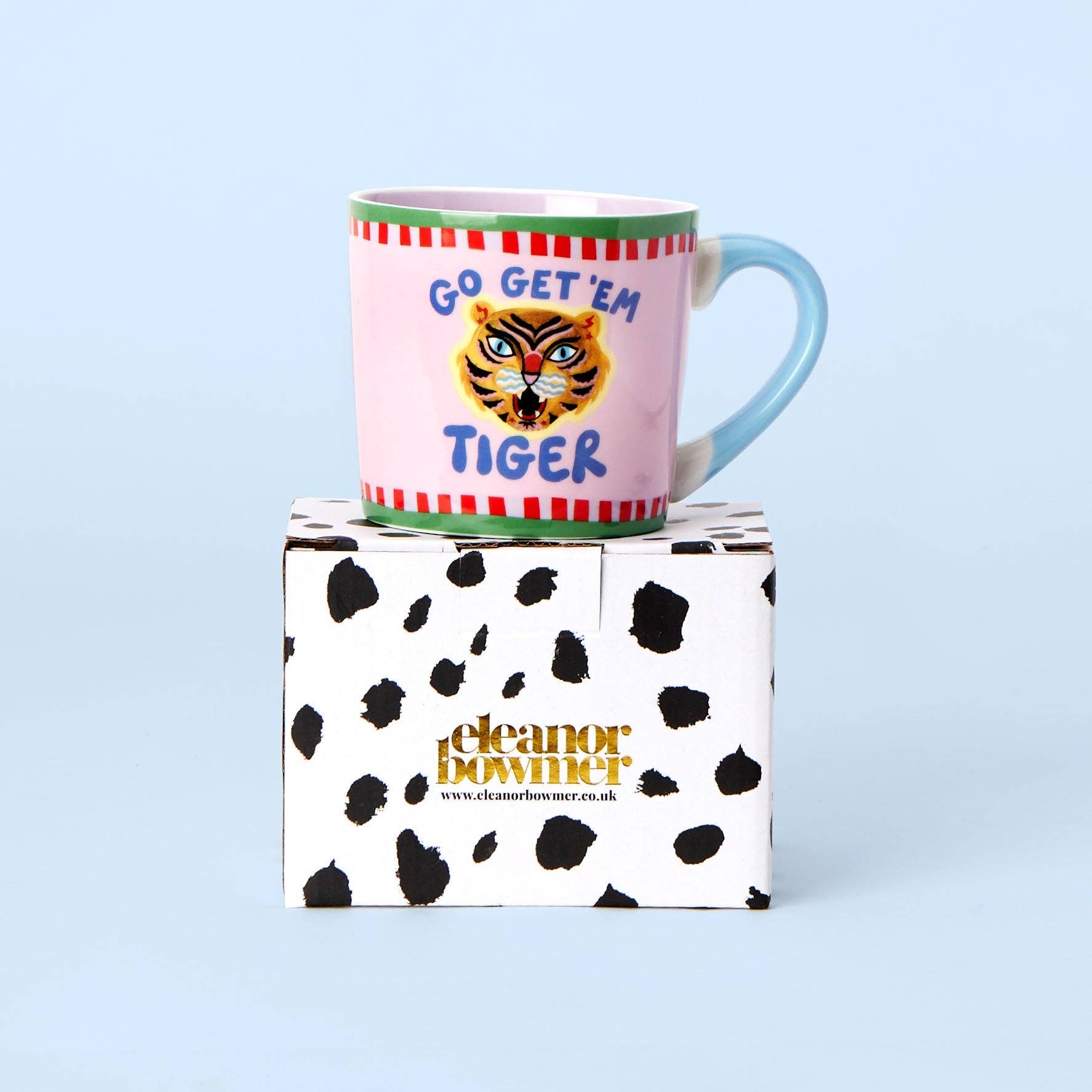 Mug with 'Go Get 'Em Tiger' design on a box with 'Eleanor Bowmer' branding.