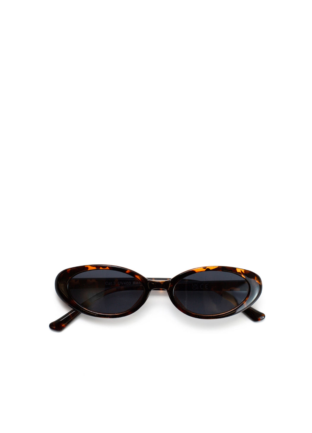 Sunglasses with tortoiseshell frame and dark lenses on a white background