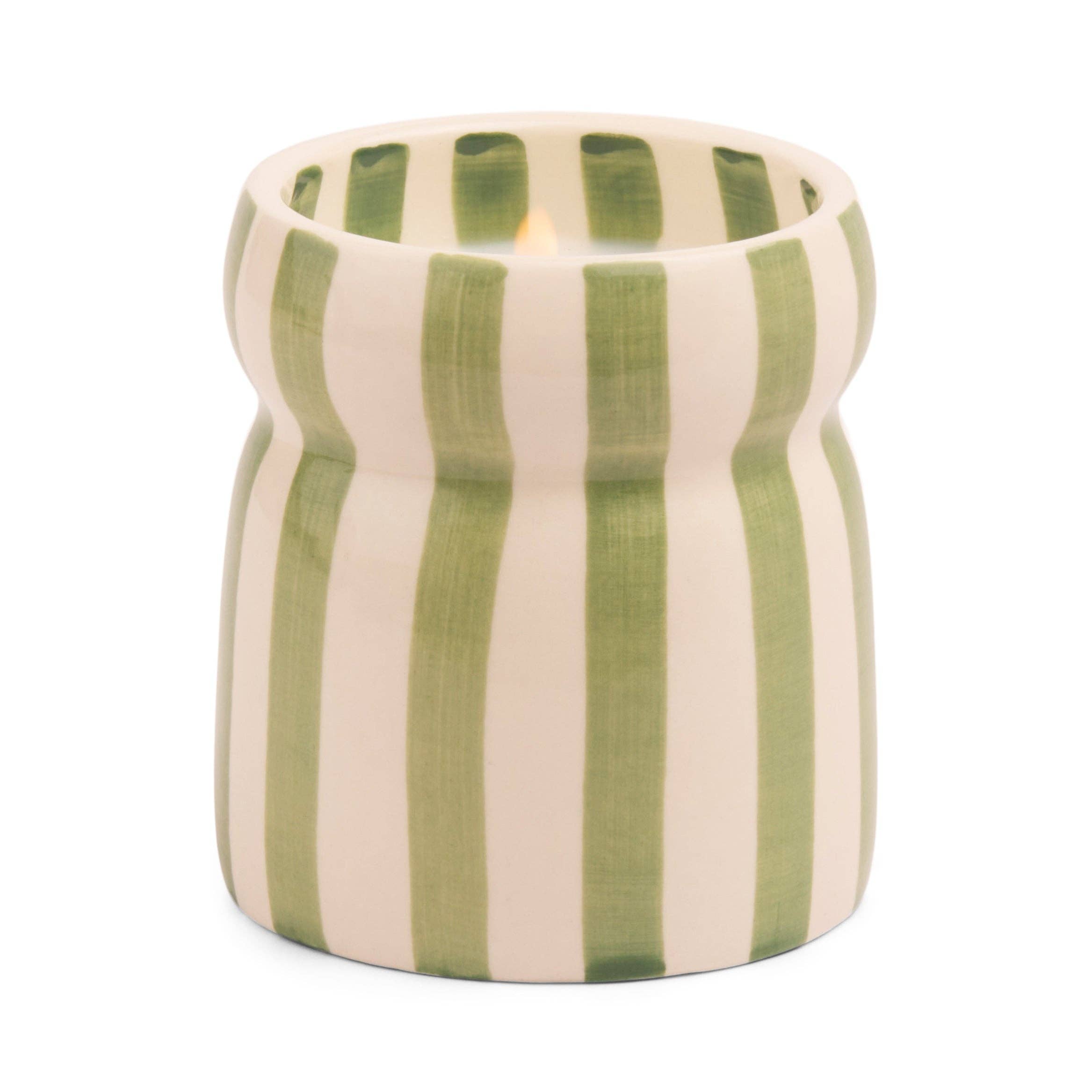 Cylindrical candle holder with green and white stripes on a white background