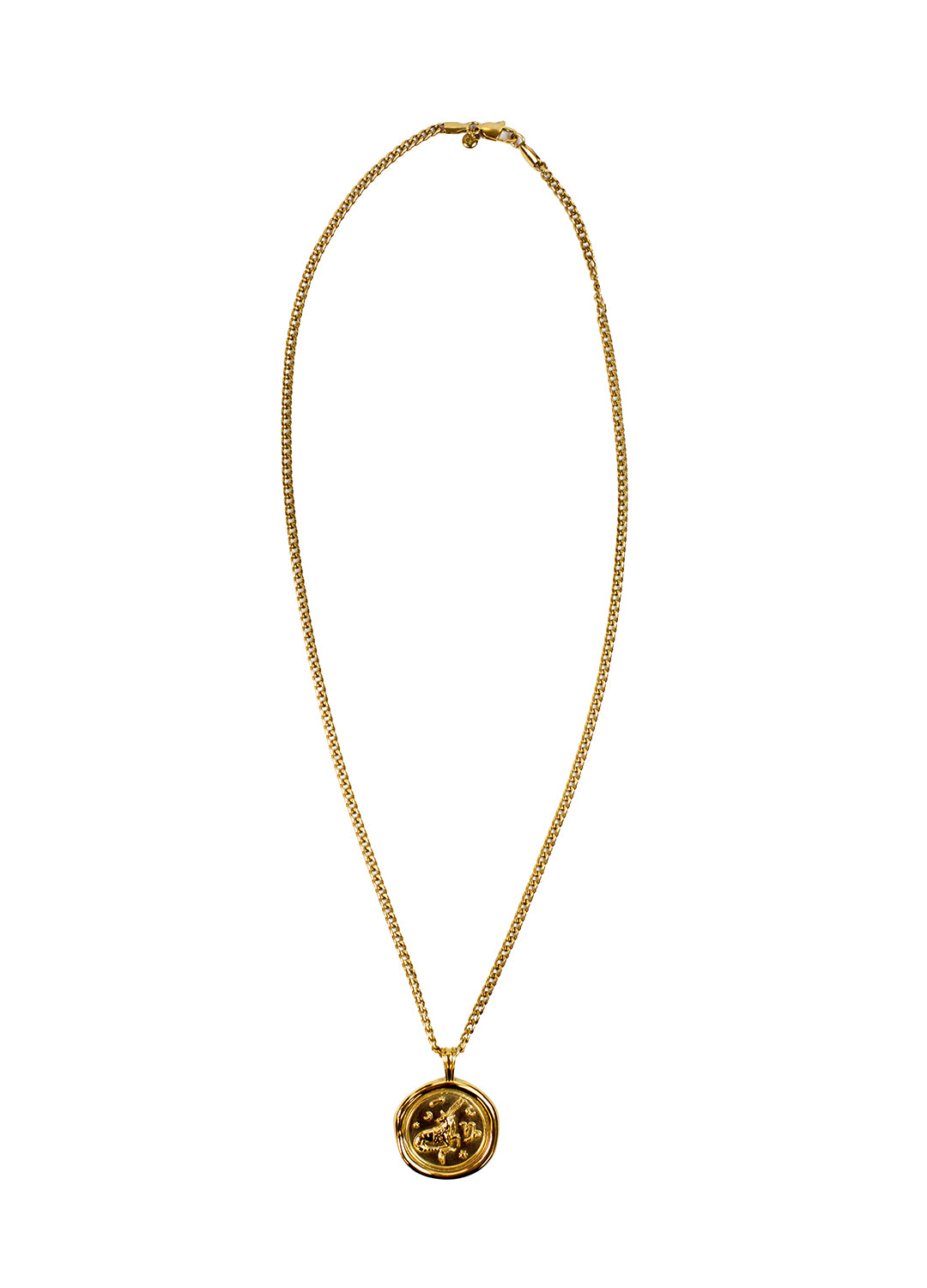 A gold chain necklace with a circular medallion pendant featuring a stylized face, displayed against a solid white background.