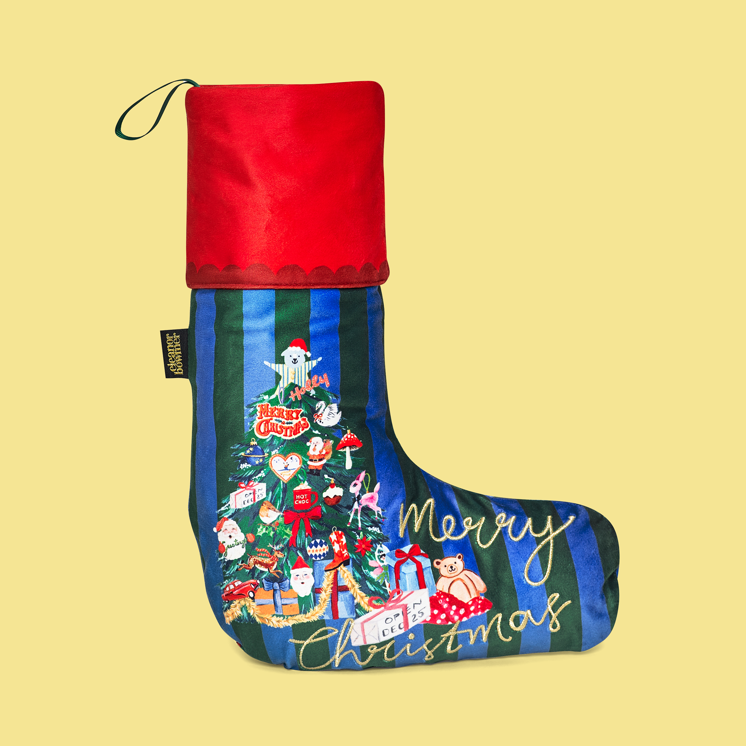 Decorative Christmas stocking with festive design on a yellow background