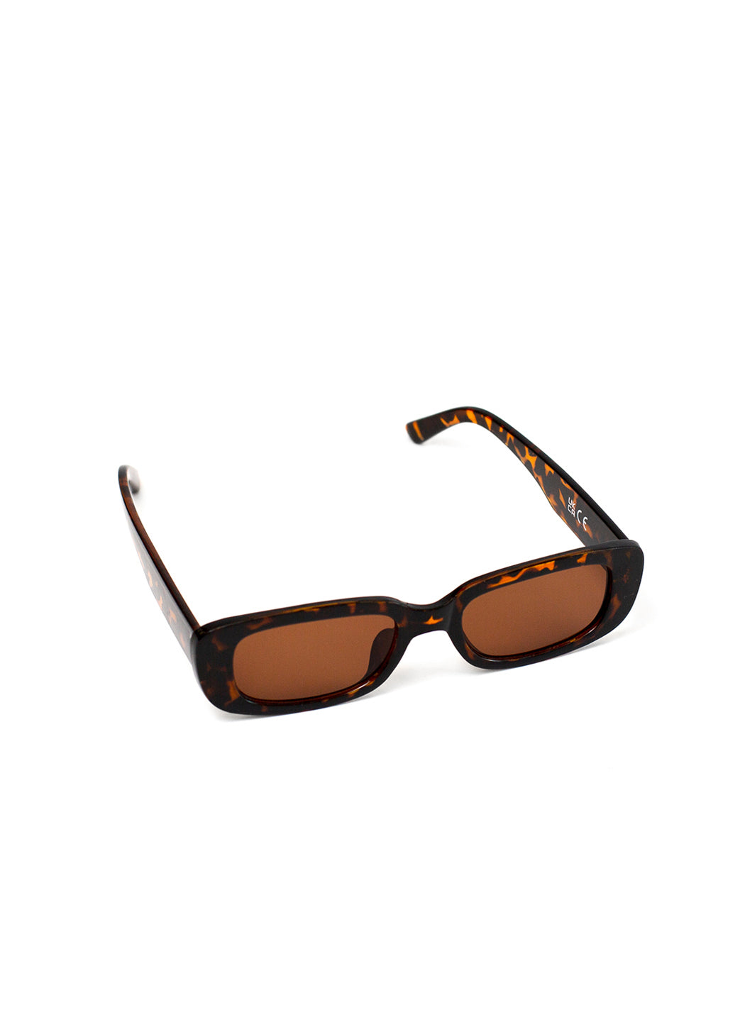 Sunglasses with tortoiseshell frame and brown lenses on a white background
