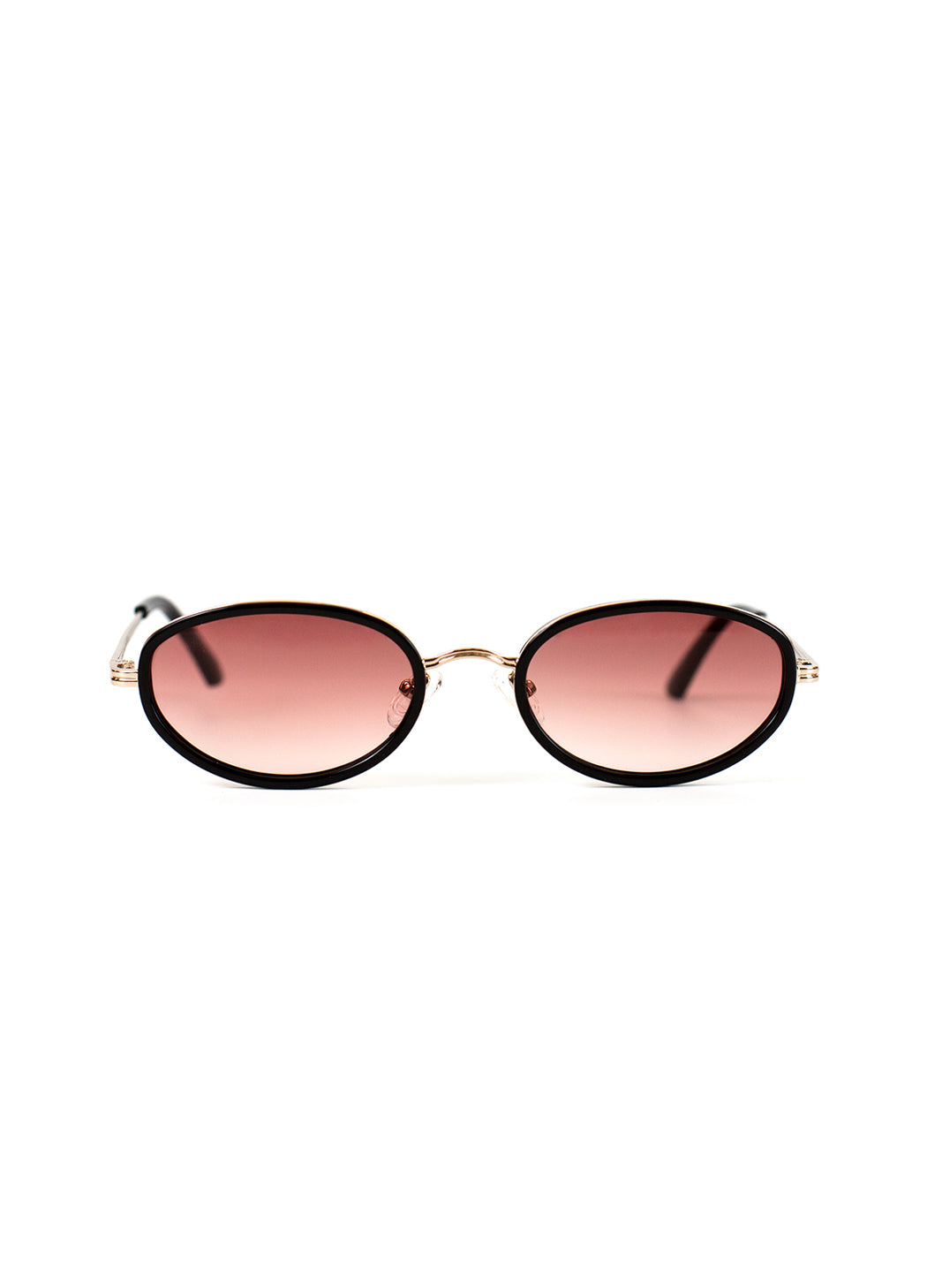 Sunglasses with gold frame and pink gradient lenses on a white background