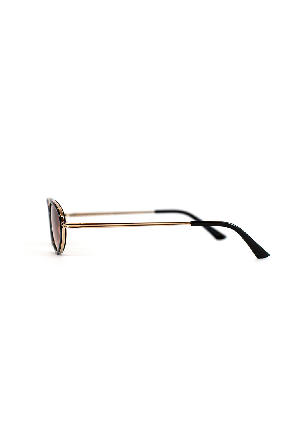 Sunglasses with gold frame and black arms on a white background