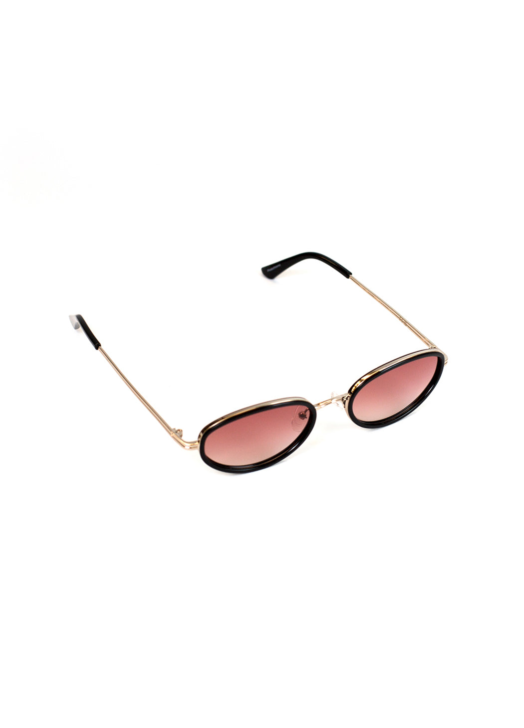 Sunglasses with gold frame and pink lenses on a white background