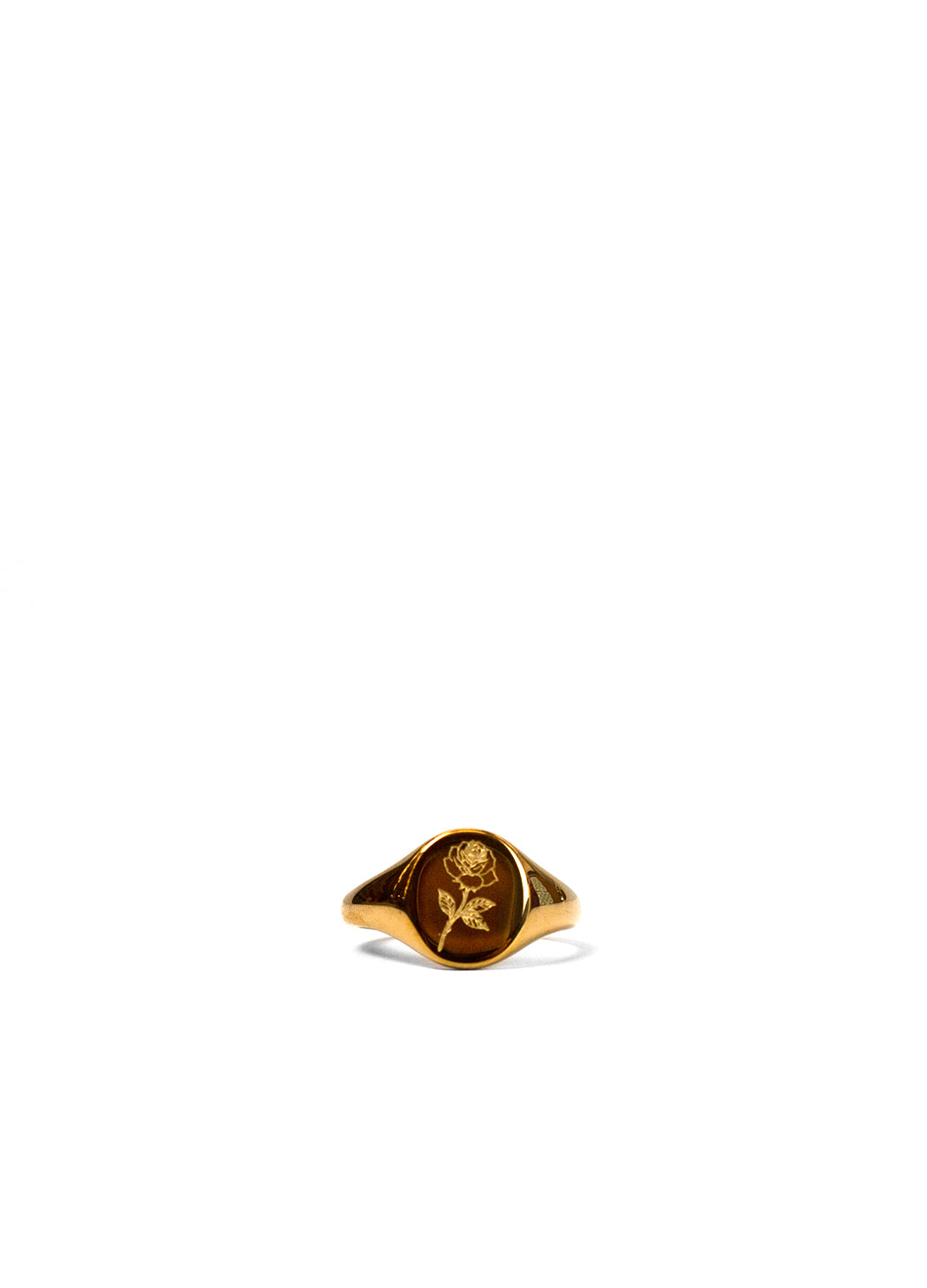 A gold signet ring featuring an engraved rose motif on a clean white background.