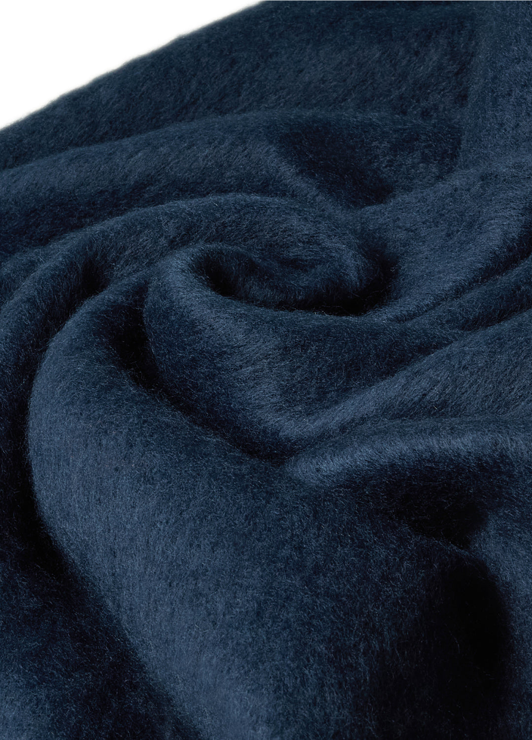 Close-up of a dark inky blue fabric texture