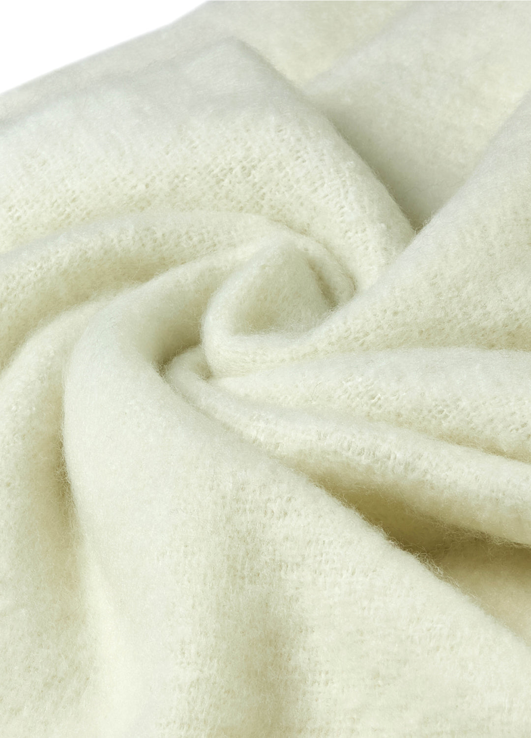 Close-up of a textured cream-colored fabric