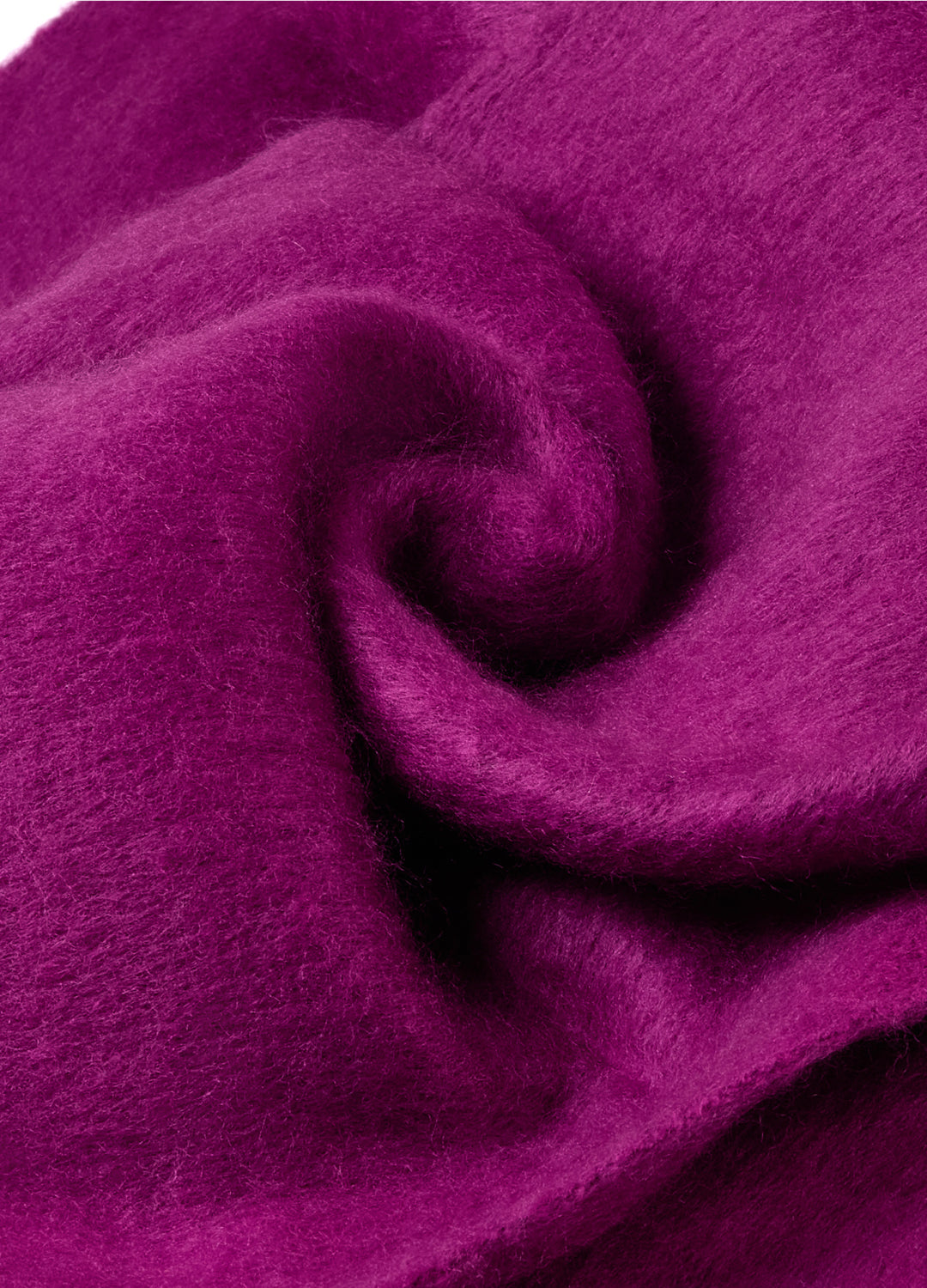 Close-up of purple fabric with a swirl pattern