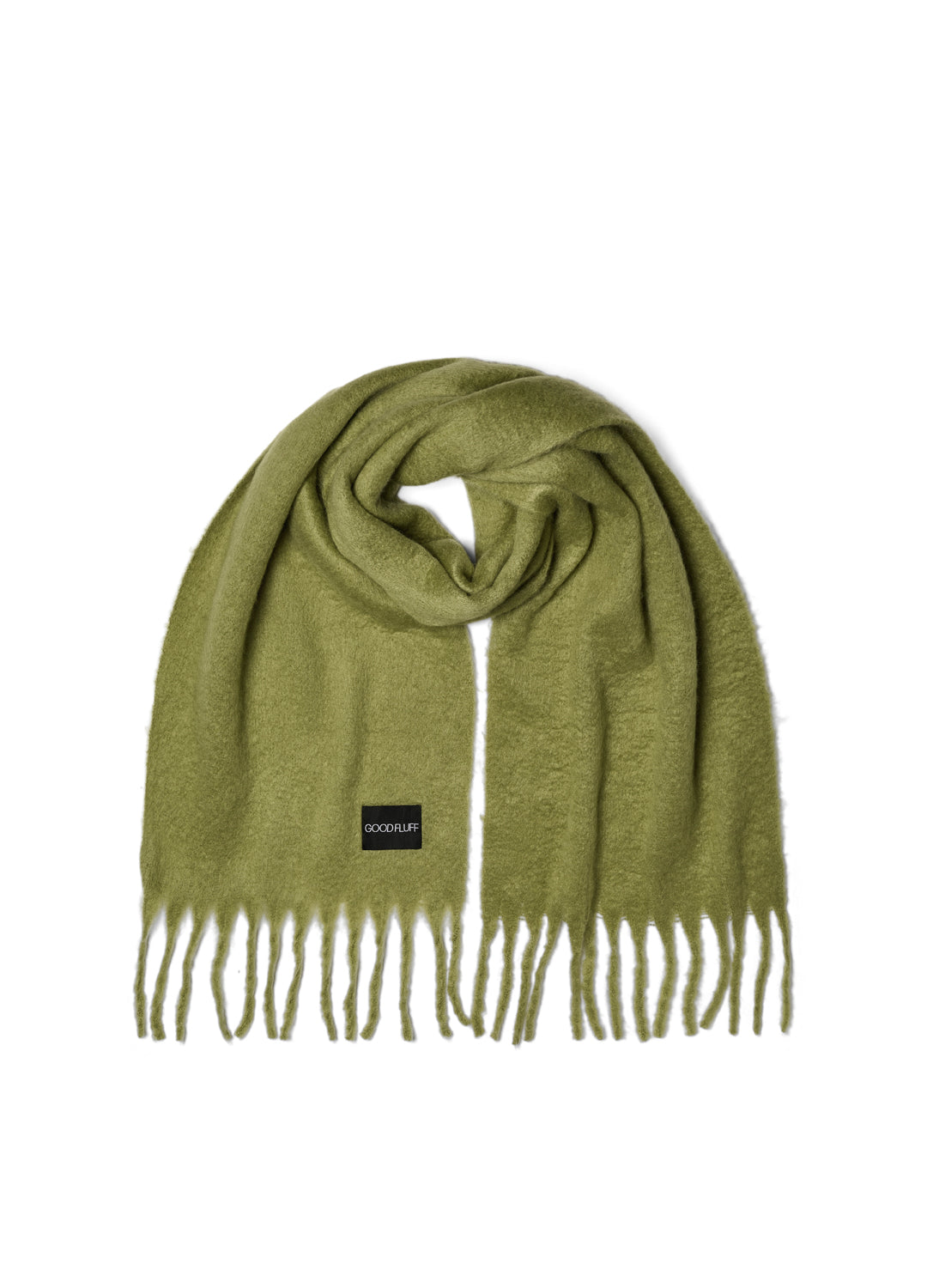 Green scarf with fringes and a brand label on a white background