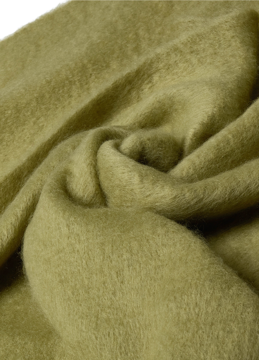Close-up of green fabric with folds