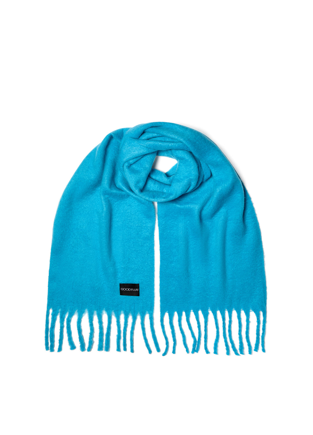 Turquoise scarf with fringed ends on a white background