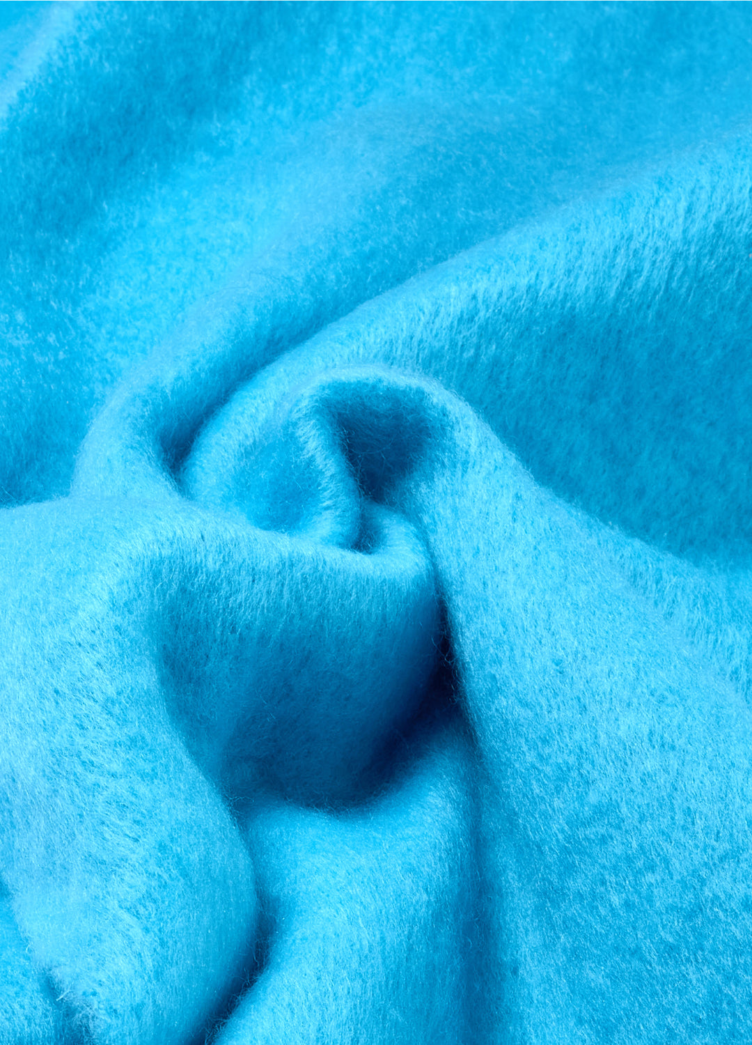 Close-up of blue fabric with a soft texture