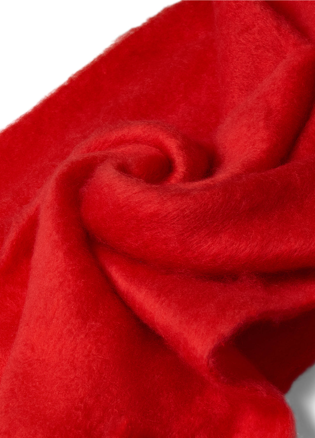 Close-up of bright red fabric with a soft texture