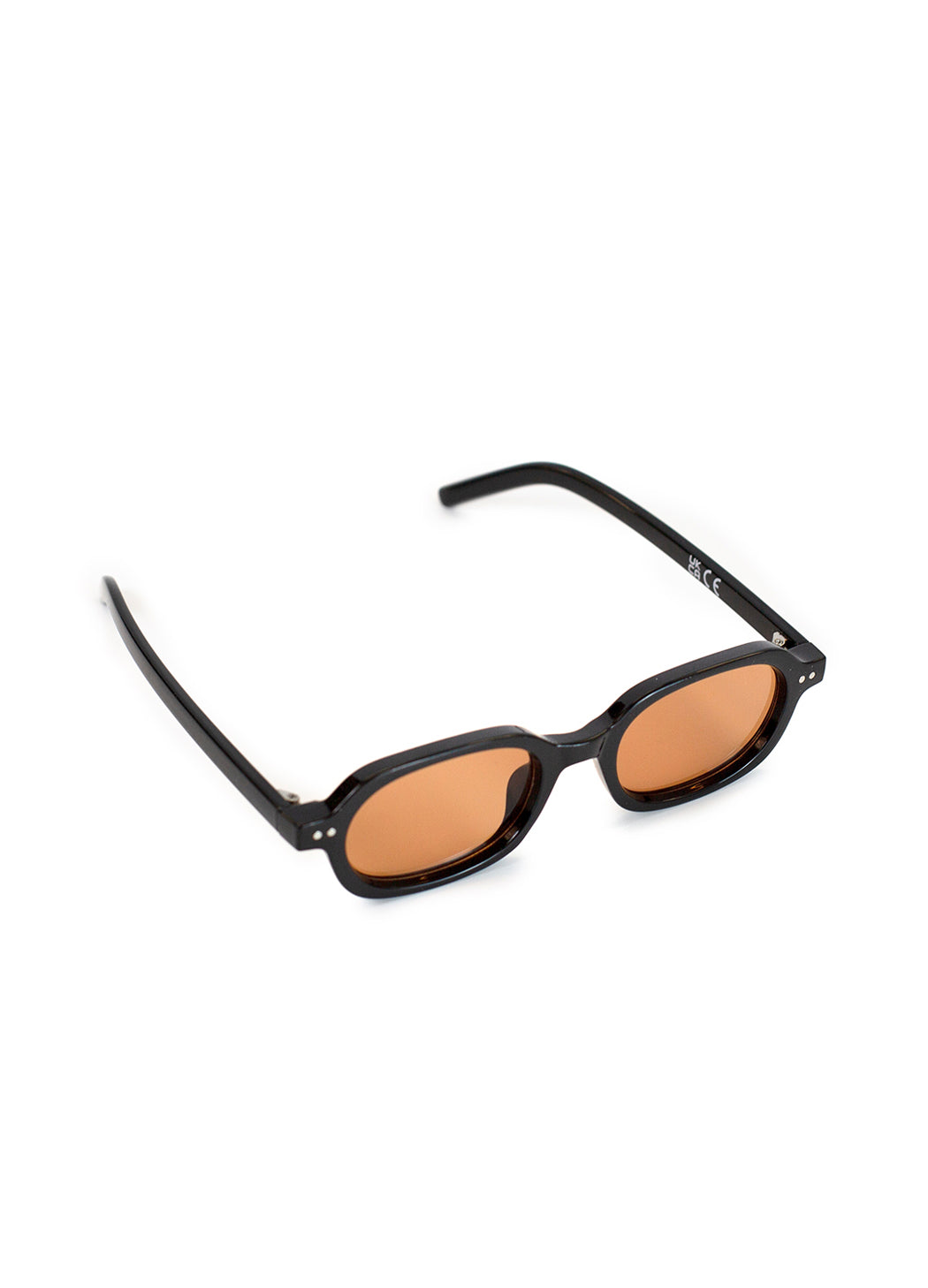 Black sunglasses with brown lenses on a white background