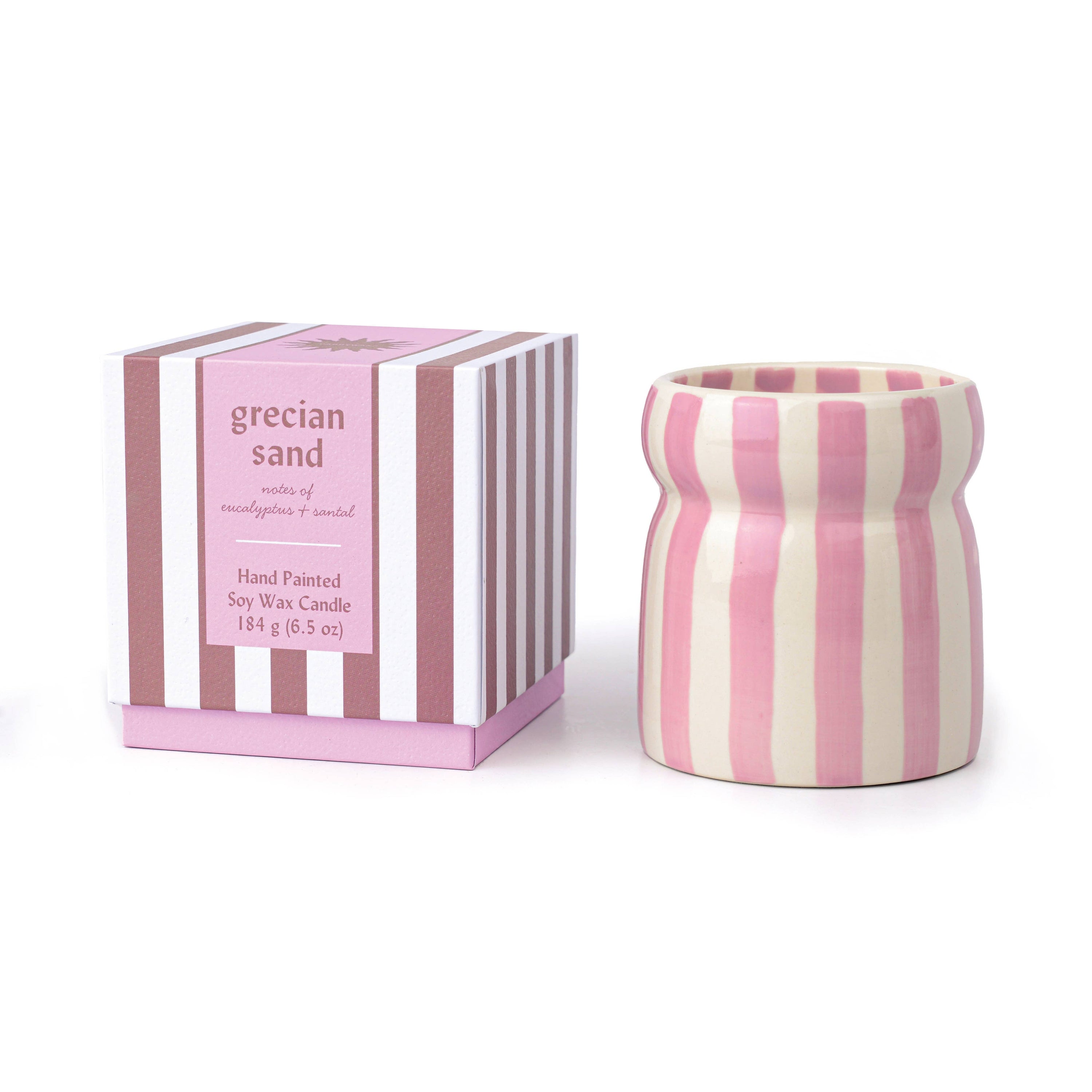 Pink and white striped candle with matching box on a white background