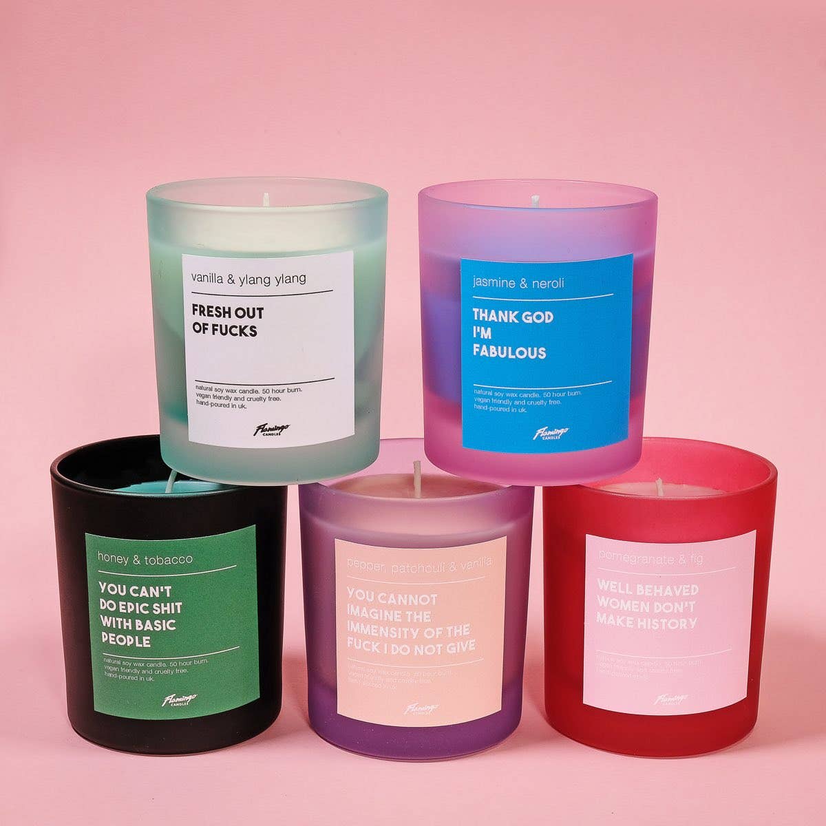 Five colourful candles with labeled text on a pink background