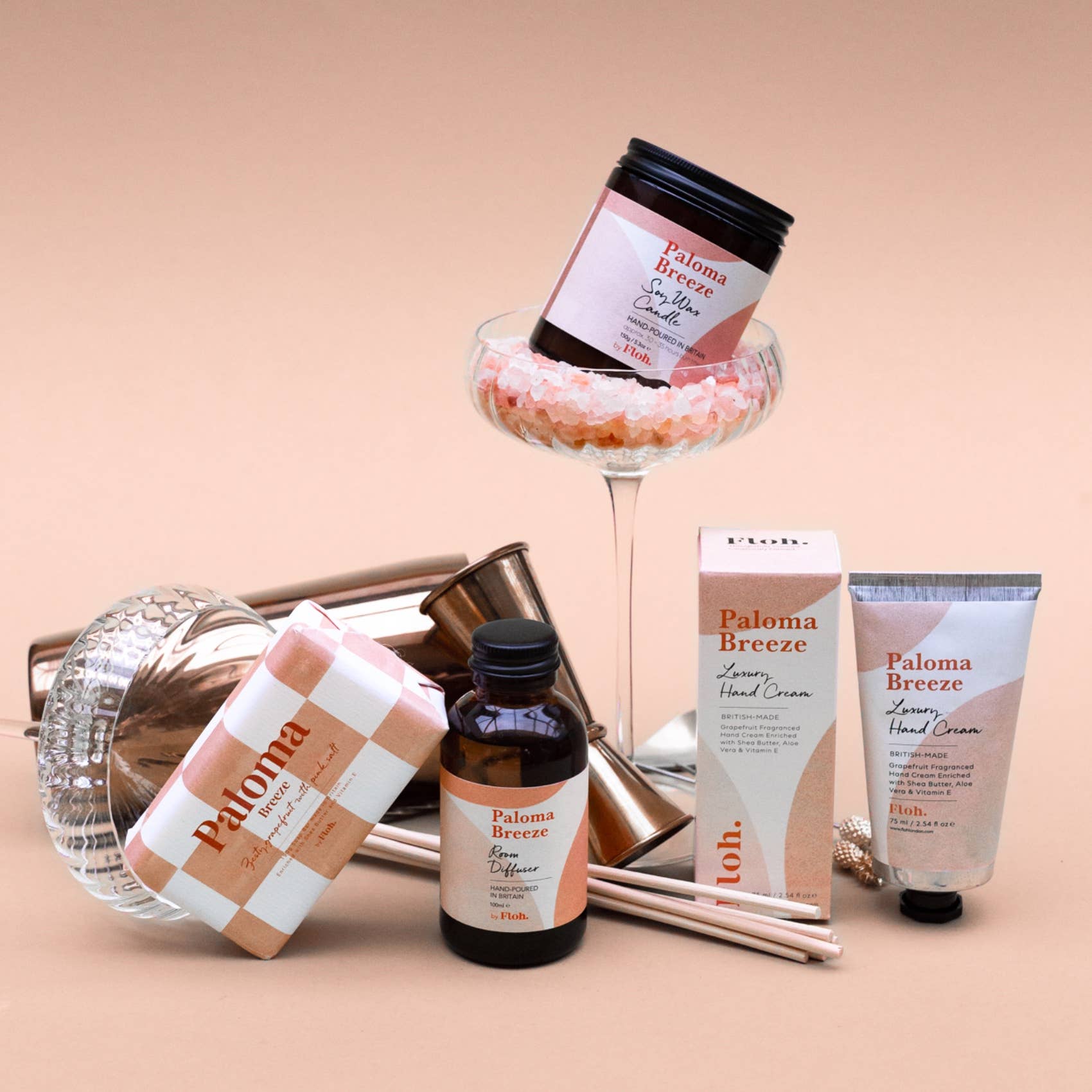 Collection of Paloma Breeze skincare products on a beige background