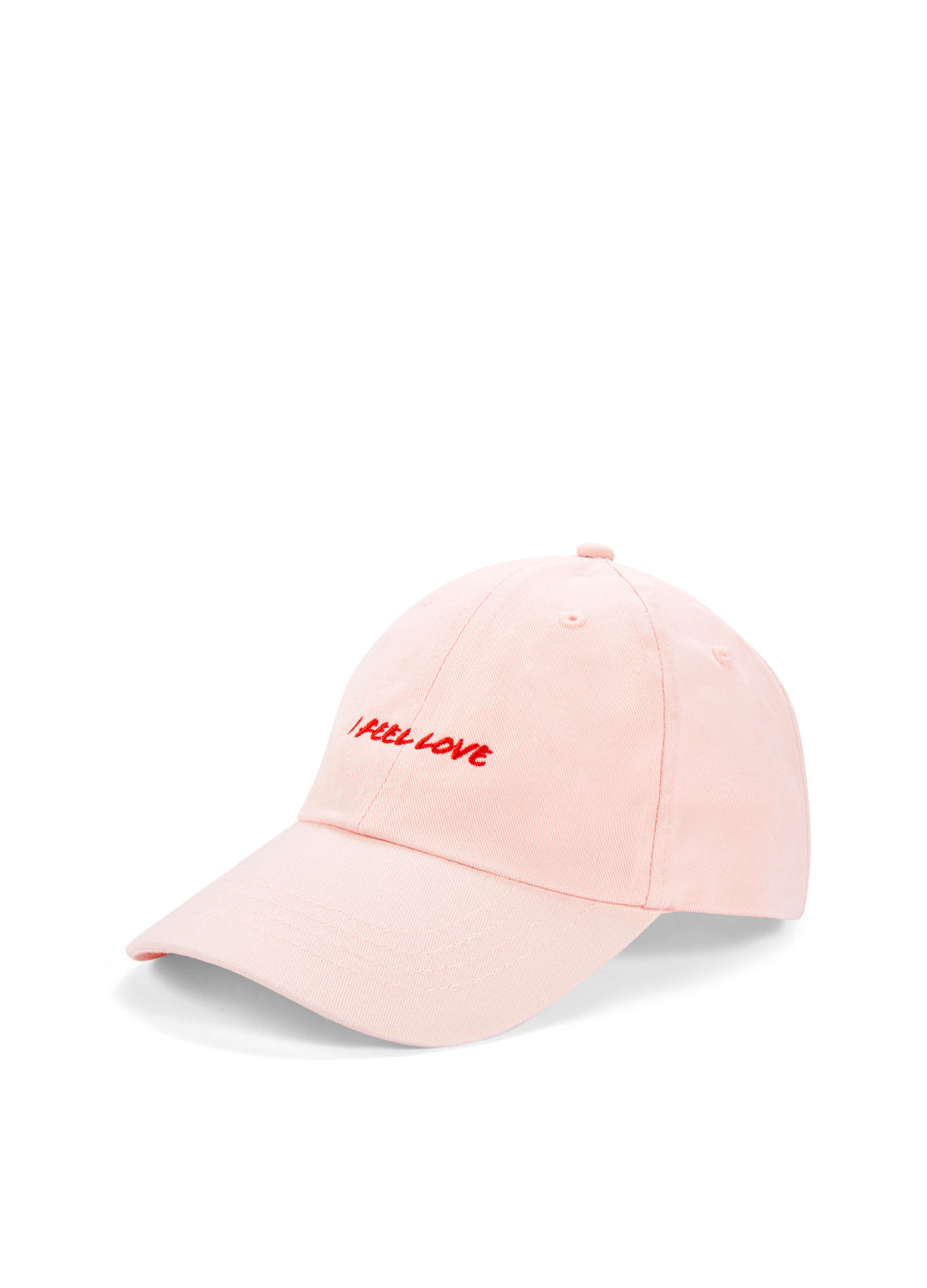 Pink cap with red embroidered text on a white background 