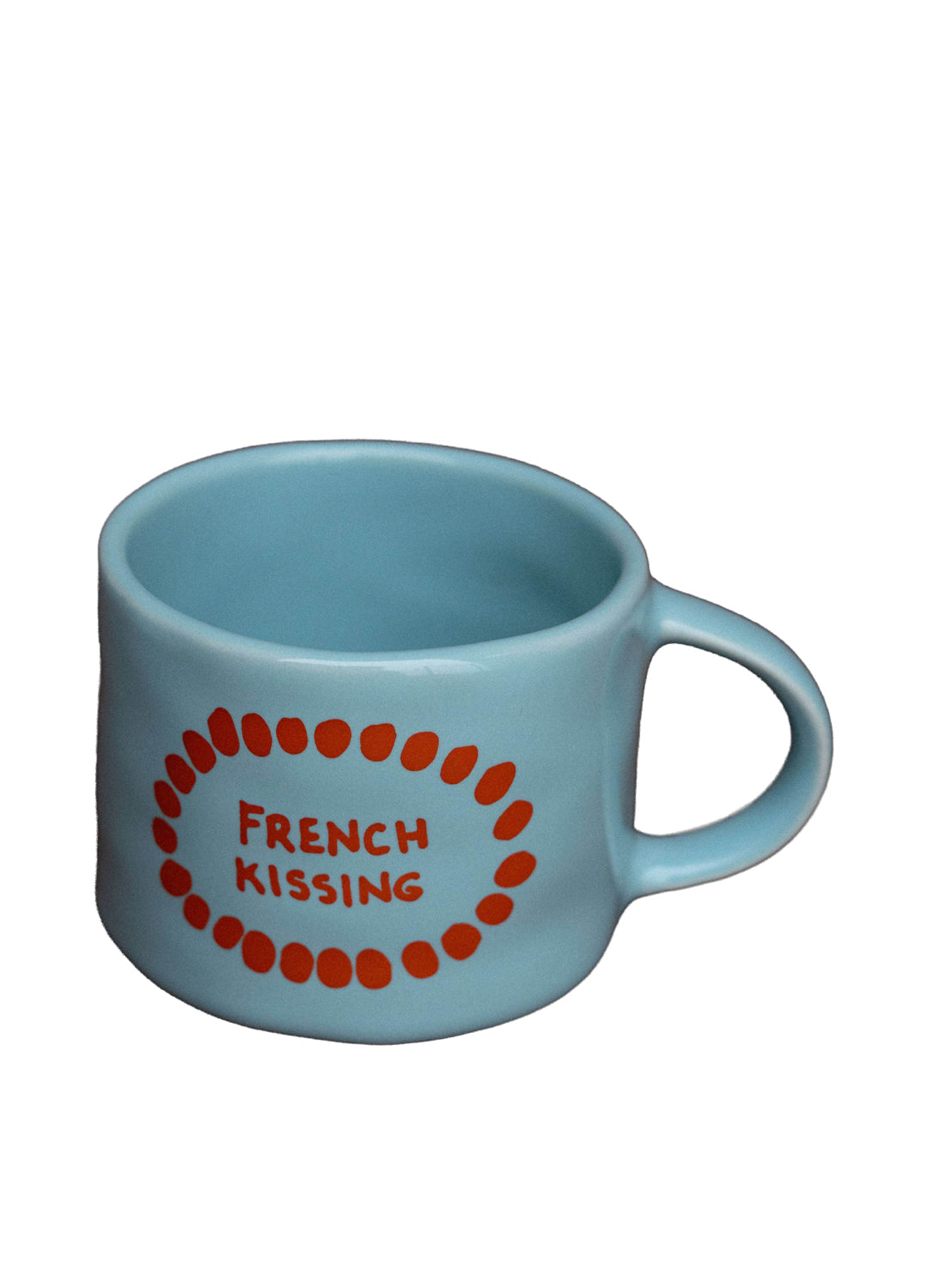 Light blue mug with 'French Kissing' text on a white background