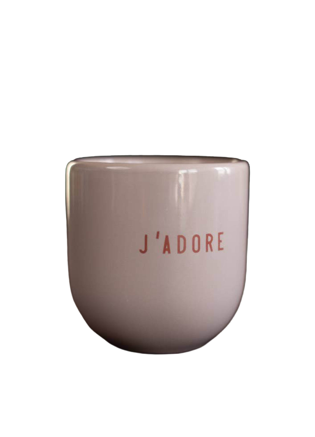 Ceramic mug with 'J'adore' text on a white background