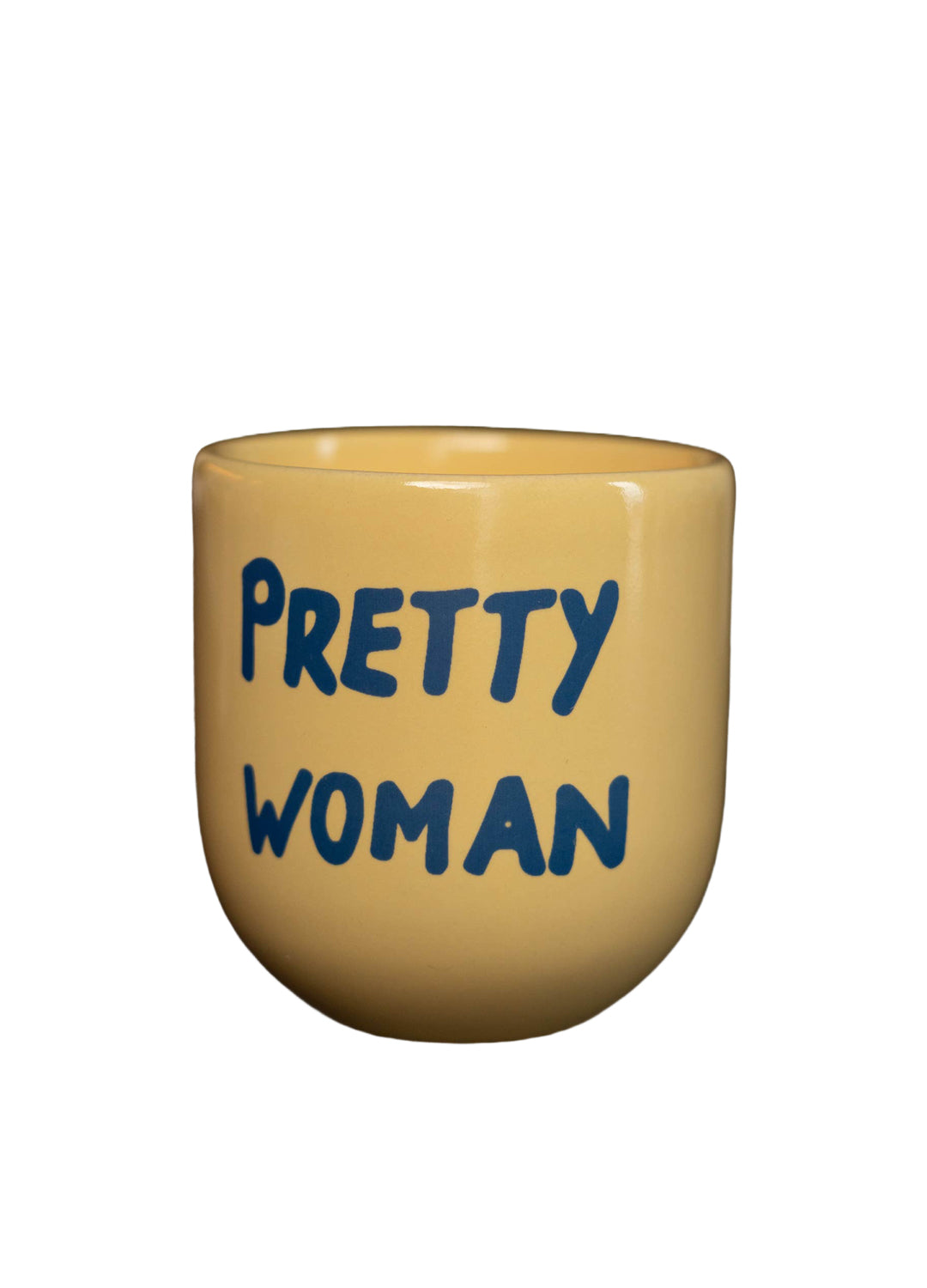 Yellow mug with blue 'Pretty Woman' text on a white background