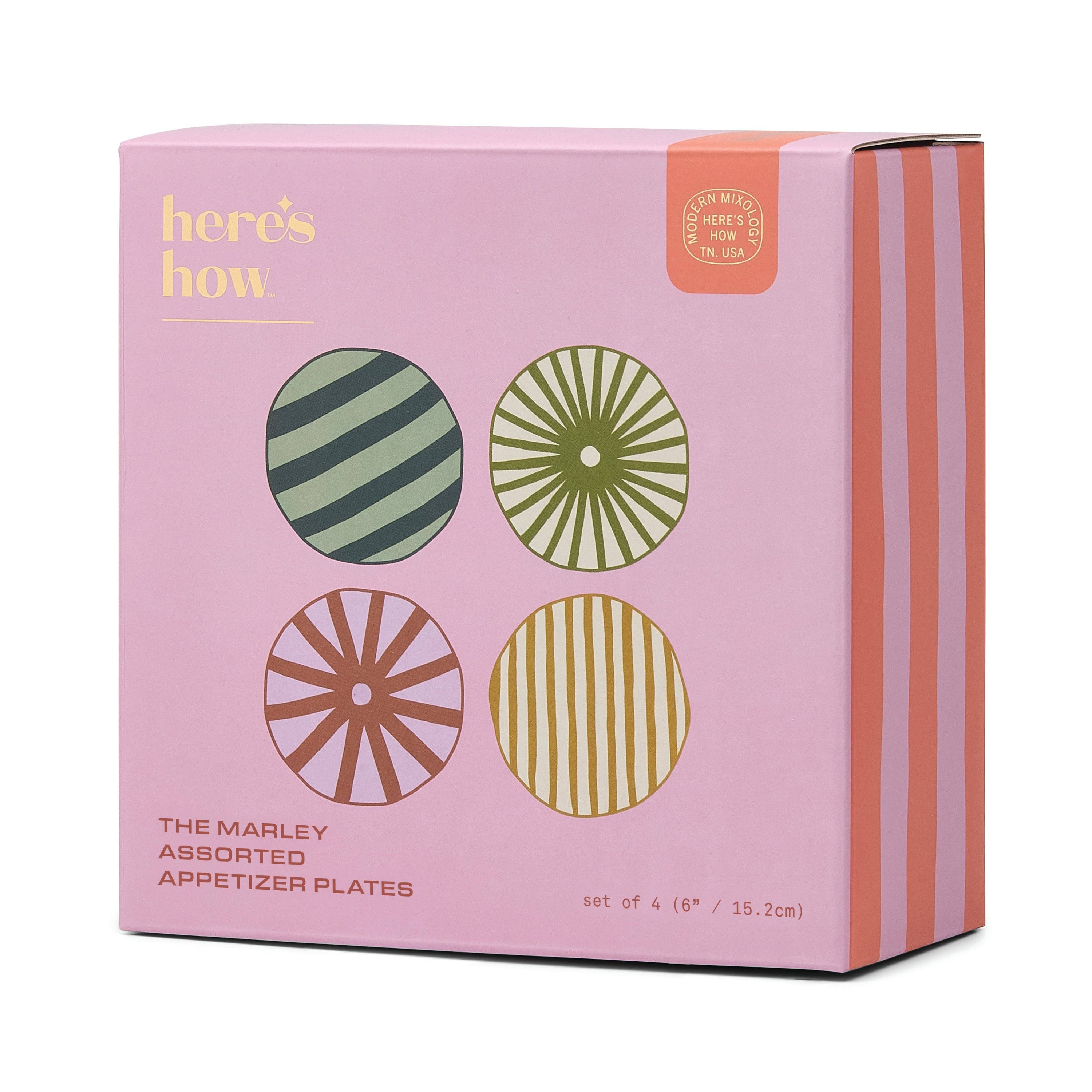 Pink packaging of 'here's how' Marley assorted appetizer plates with decorative plates on a white background.