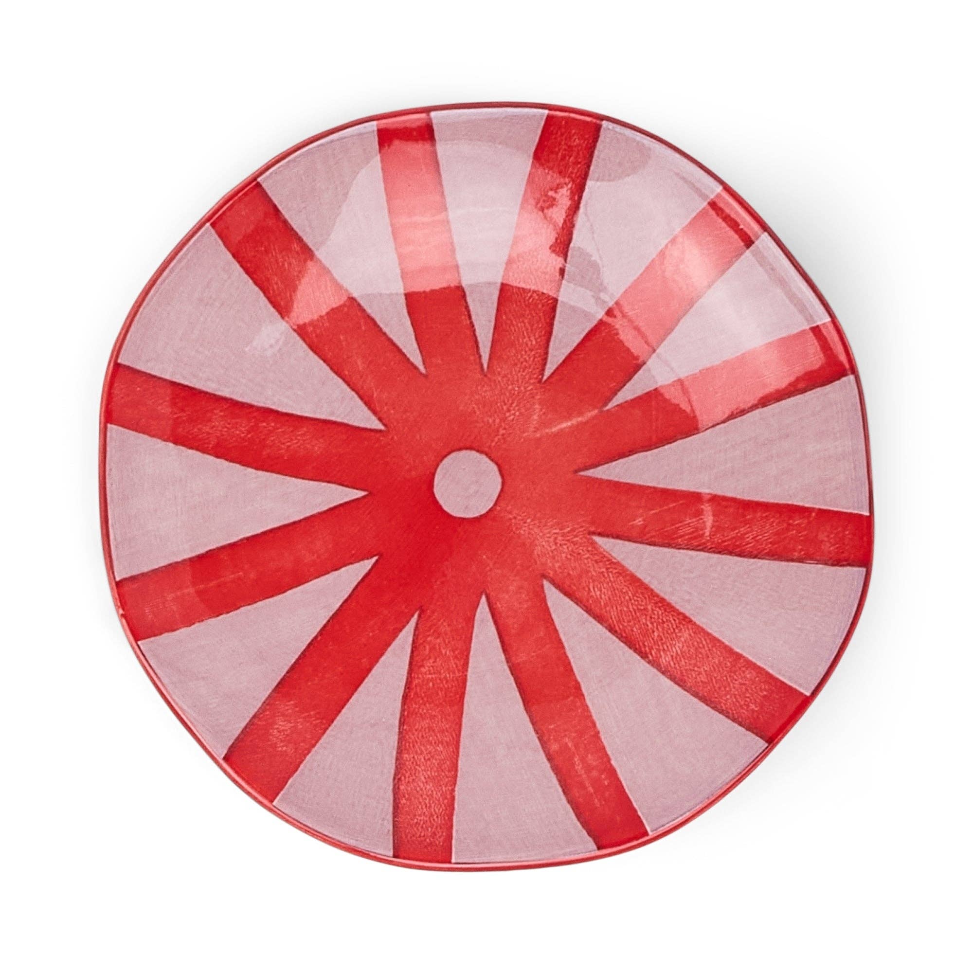 Close up of the red & pink plates with star pattern on a white background