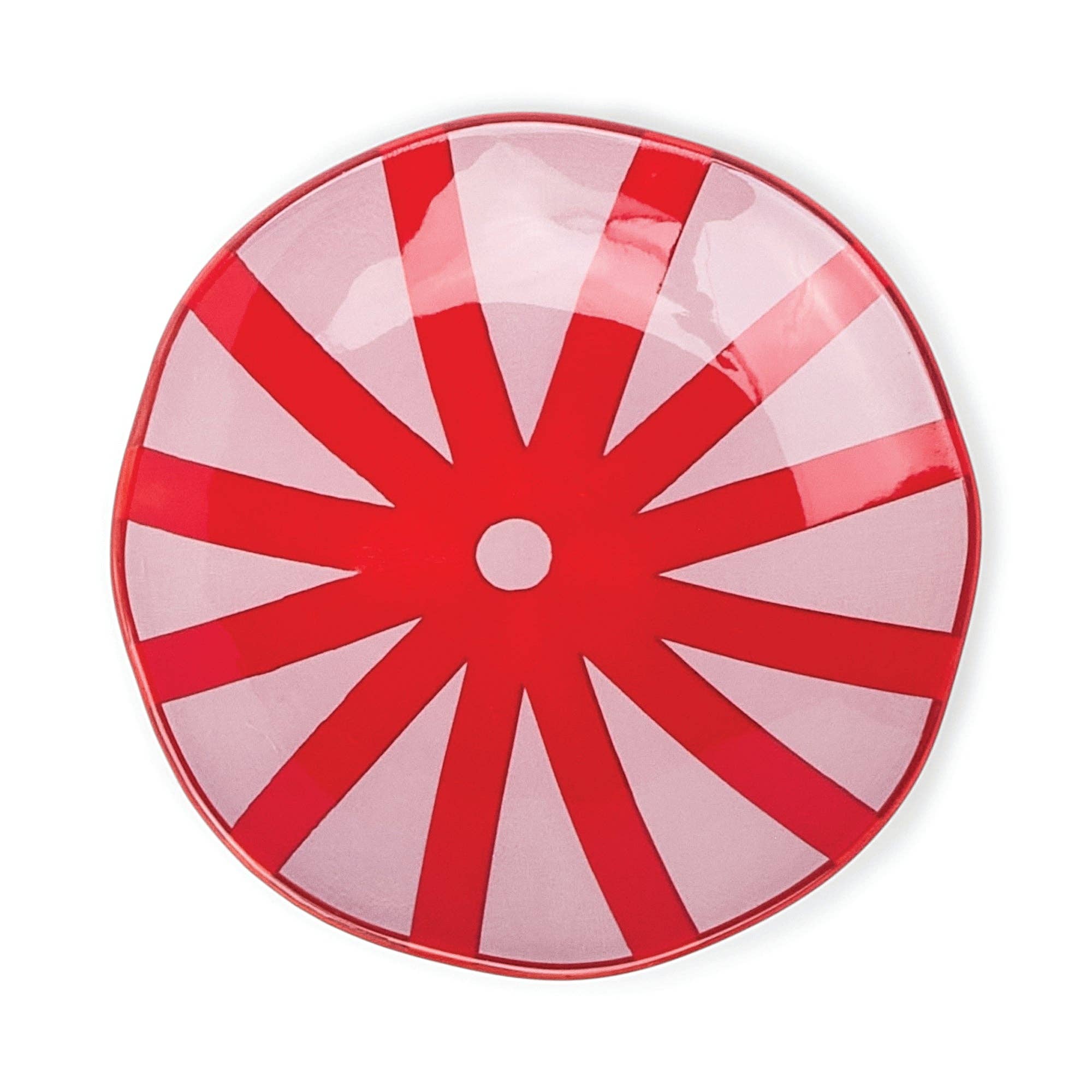 Round red and pink dish with a starburst pattern on a white background