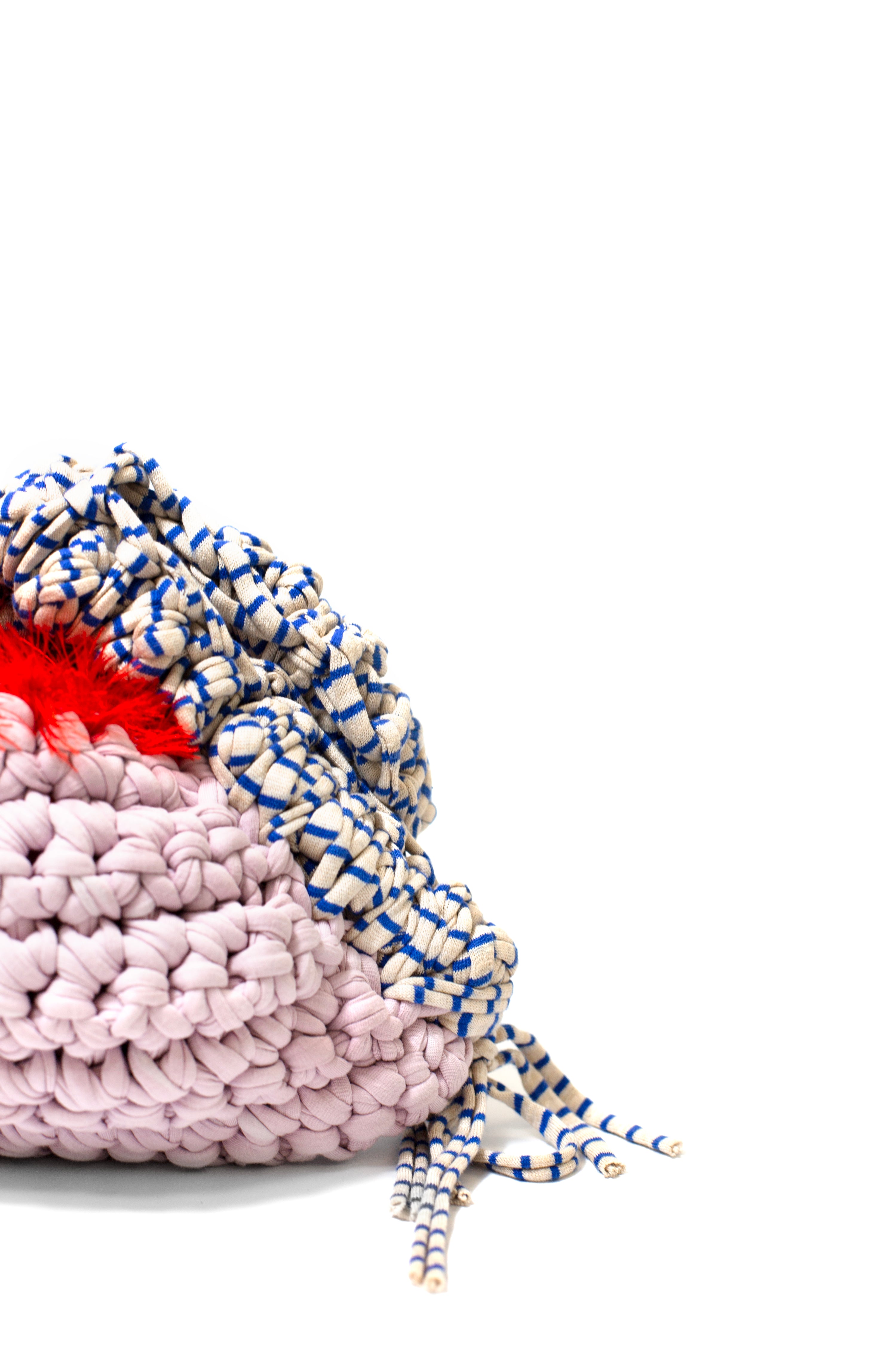 close up of the pink, blue and red maggie crochet bag by sloe mosey