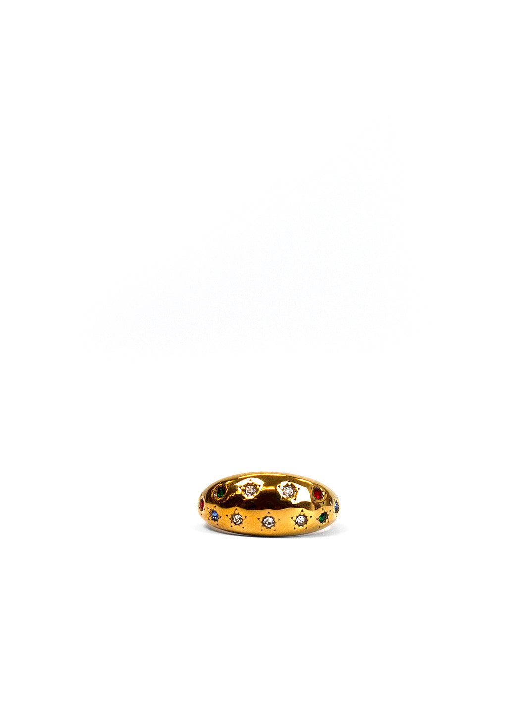 A gold band ring featuring a row of star-shaped motifs, some set with clear stones and others accented with small red and green gemstones, photographed on a seamless white background.