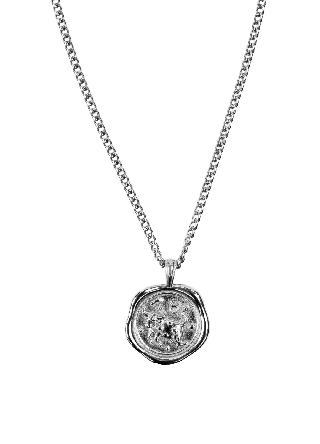 A silver-toned chain necklace with a round, textured wax-seal style pendant featuring a zodiac symbol for Taurus, shown on a plain white background.
