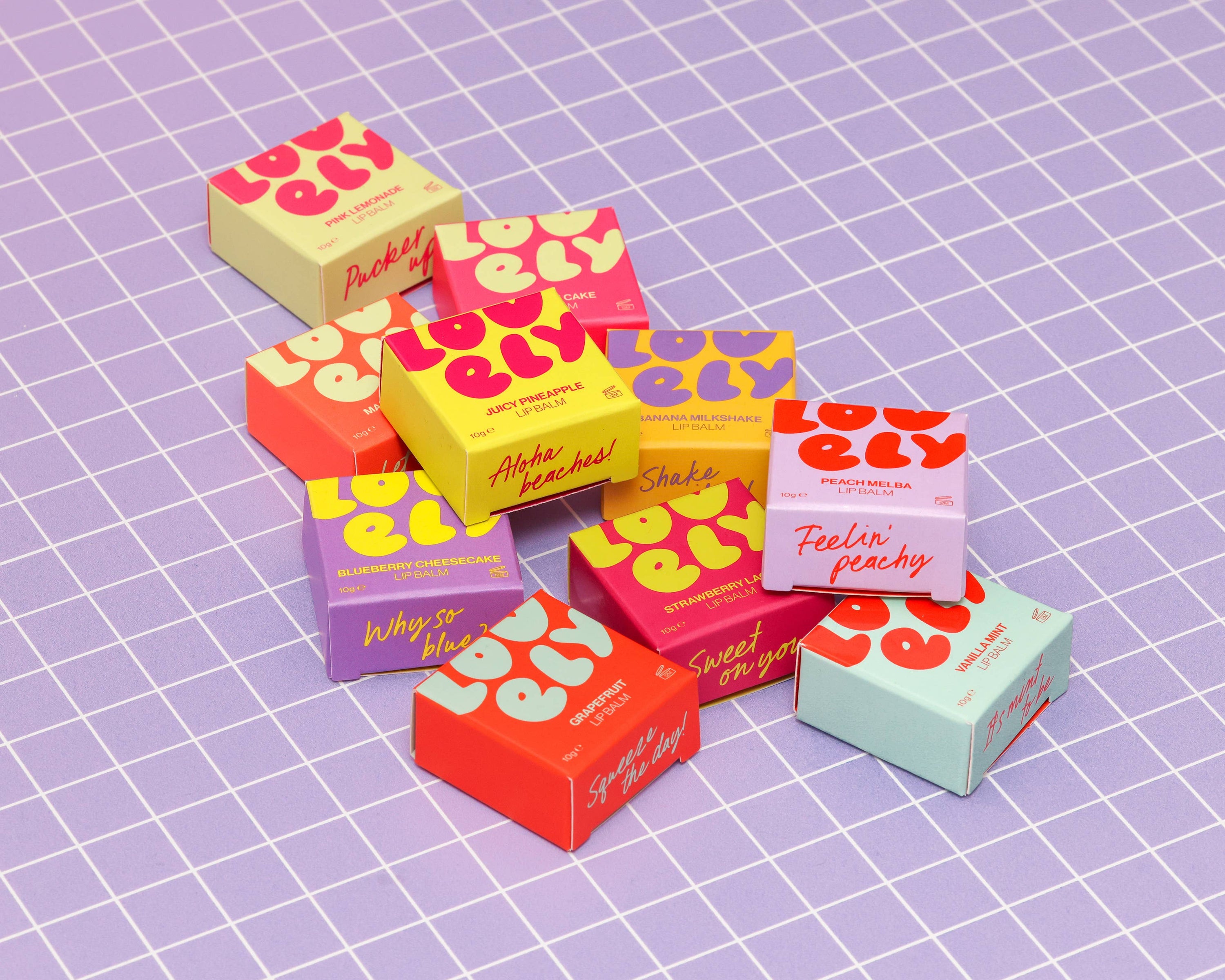 Colorful small boxes with 'ello' branding on a grid background