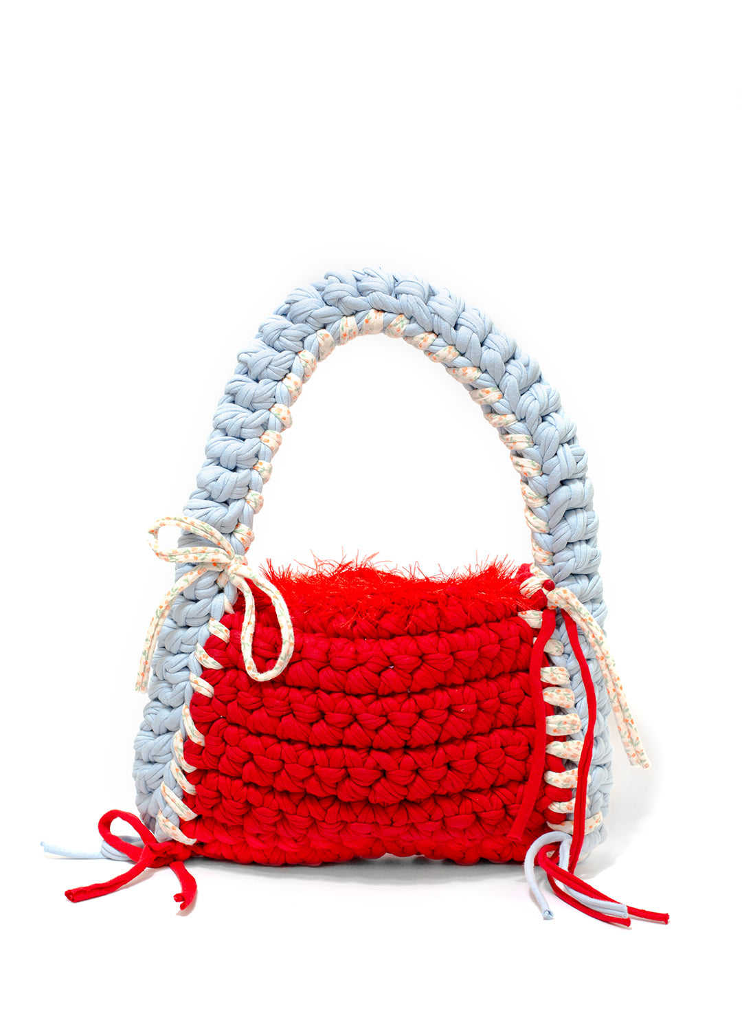 Crocheted handbag with red body and light blue handle on a white background