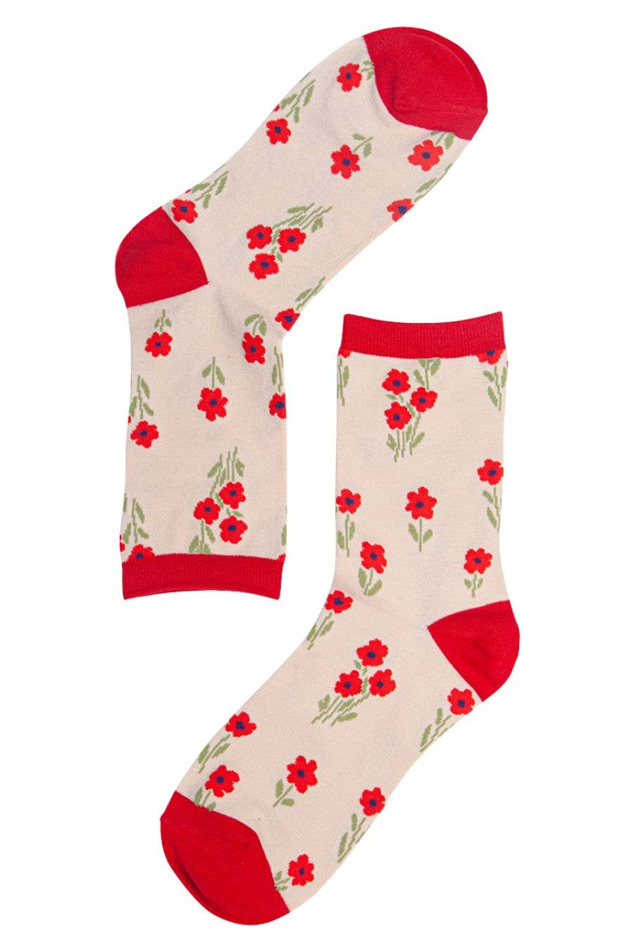 Floral patterned socks with red flowers on a beige background