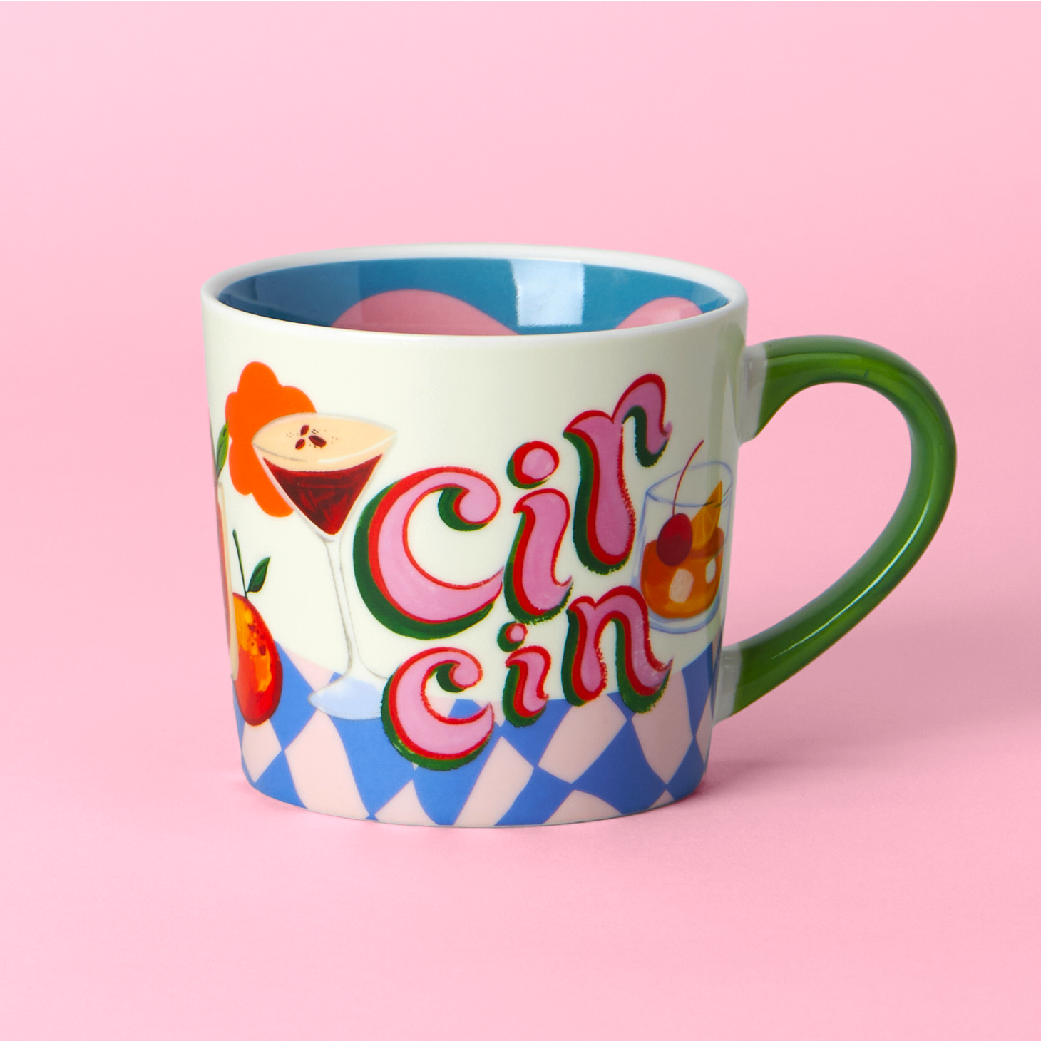 Colorful mug with 'Cin Cin' text and cocktail graphics on a pink background