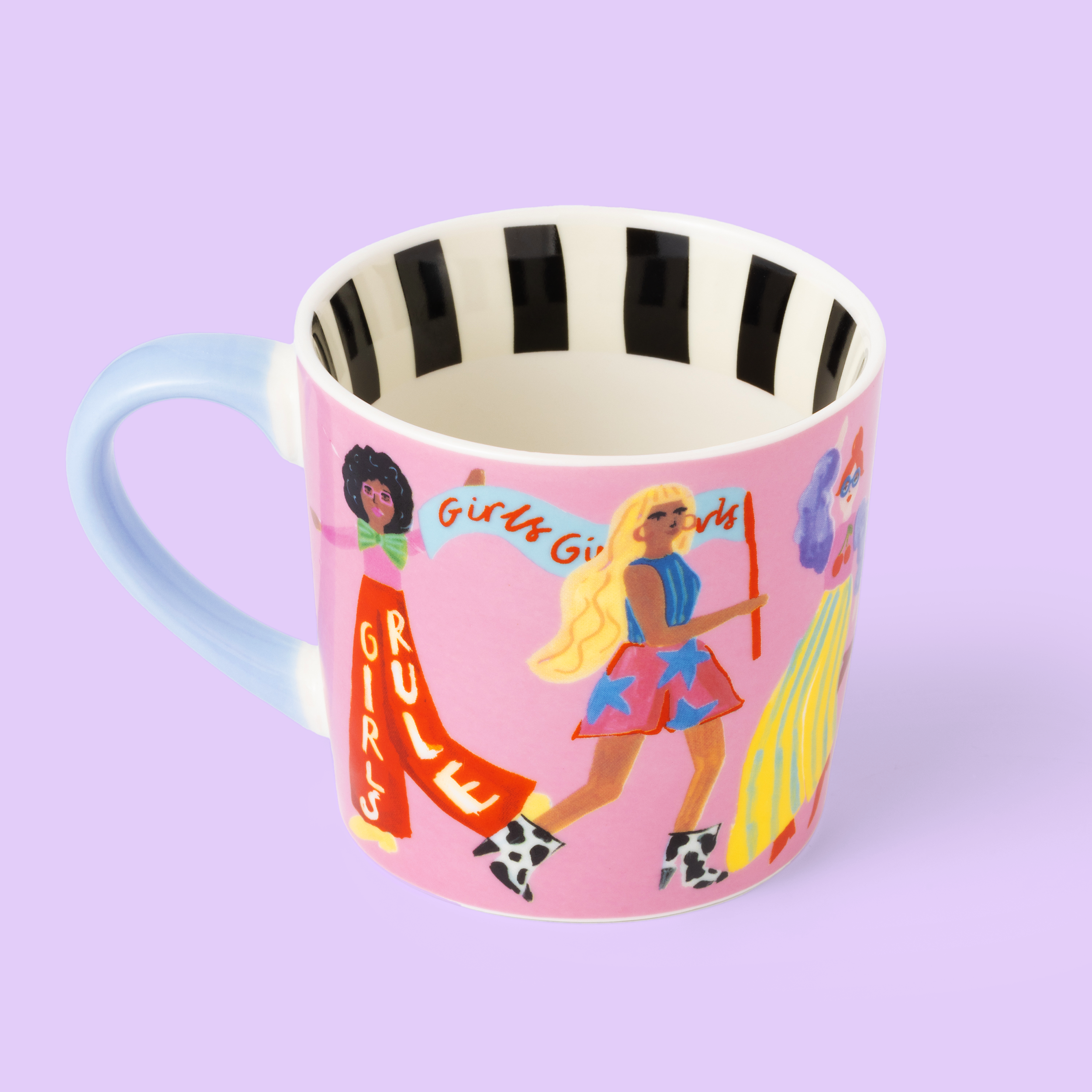 Pink mug with illustrations of women and 'Girls Rule' text on a light purple background