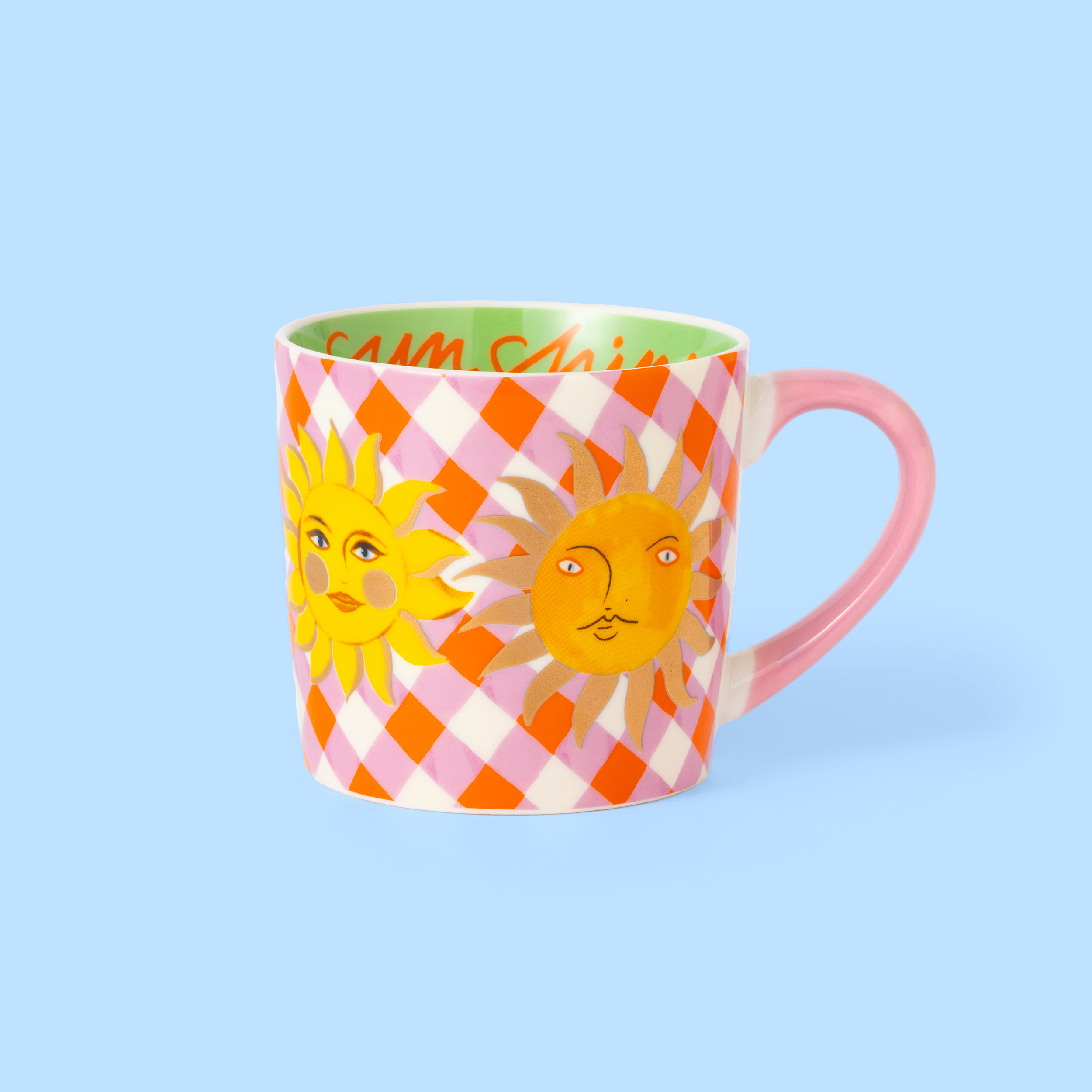 Colorful mug with sun design on a light blue background
