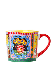 Colourful mug with artistic design on a white background