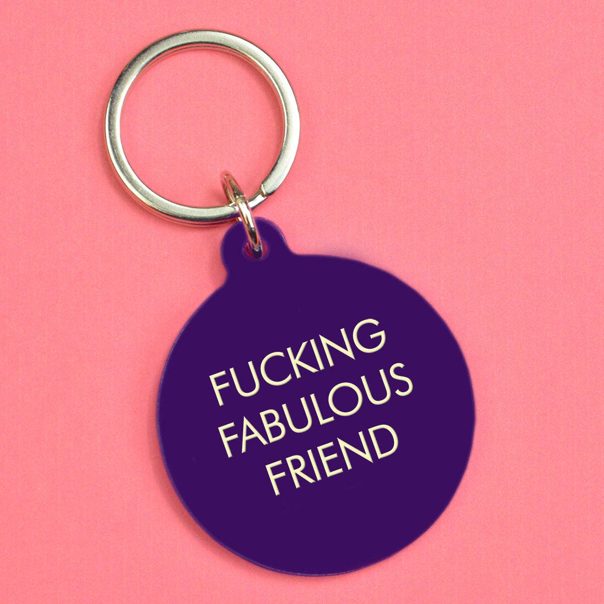 Keychain with 'Fucking Fabulous Friend' text on a pink background