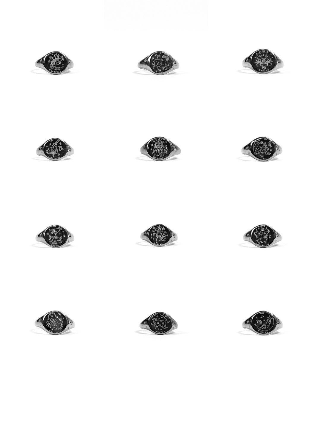 A 3x4 grid of nine identical silver signet rings with round, dark, textured inlay faces, displayed on a clean white background.