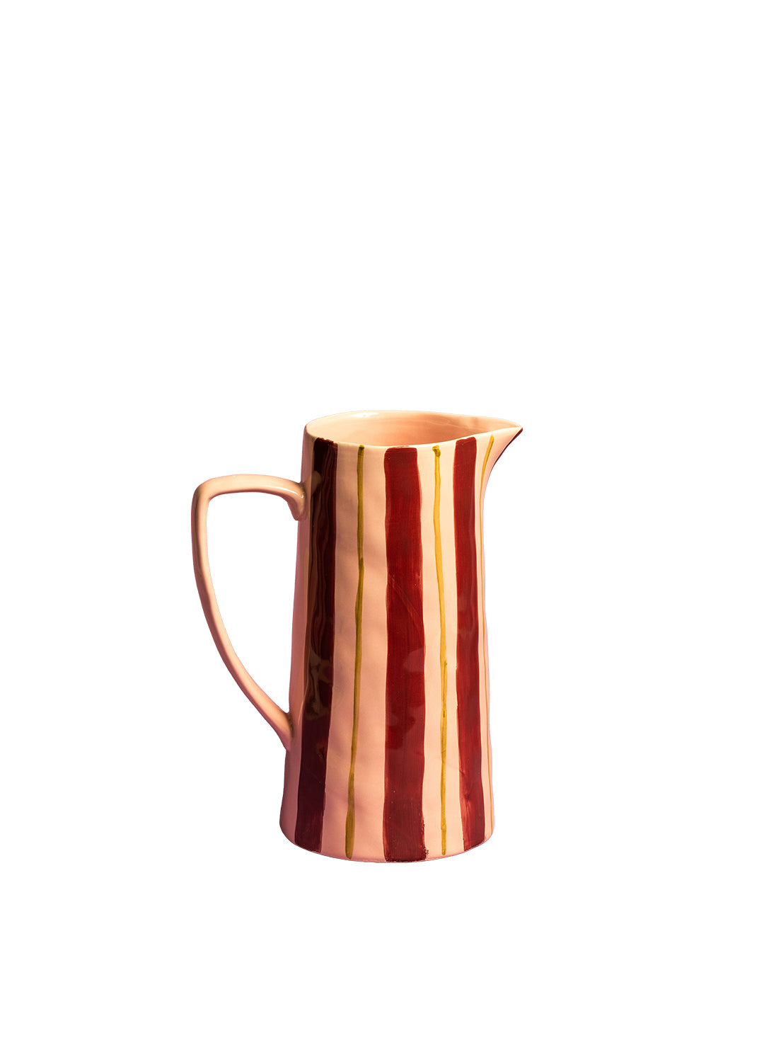 Ceramic pitcher with striped design on a white background